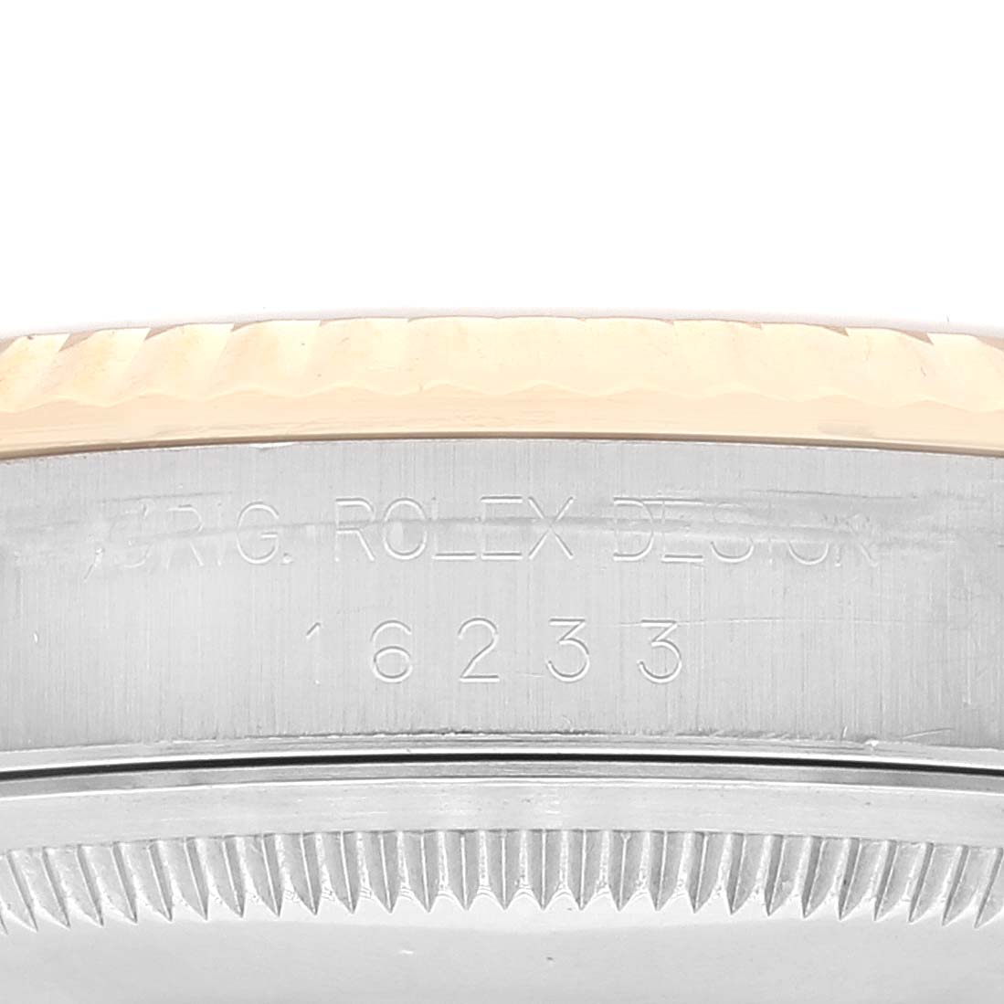 This image shows a close-up of the side of the case of a Rolex Datejust 16233 Men's Steel and Gold (two tone) Champagne Dial 16233 Men's Steel and Gold (two tone) Champagne Dial watch, displaying the model number "16233."