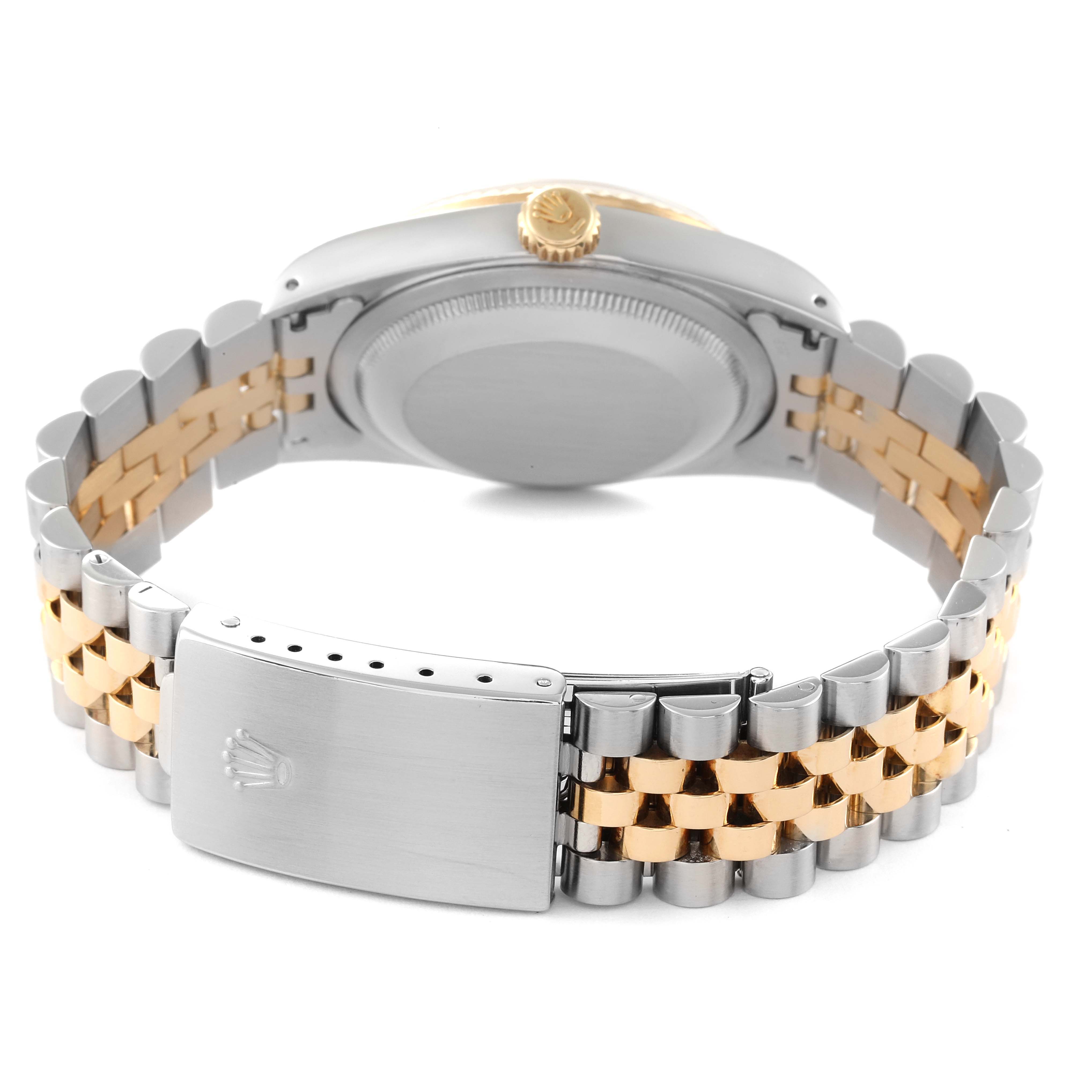 The image shows the back view of the Rolex Datejust 16233 Men's Steel and Gold (two tone) Champagne Dial 16233 Men's Steel and Gold (two tone) Champagne Dial watch, focusing on the case back, crown, and two-tone bracelet with clasp.