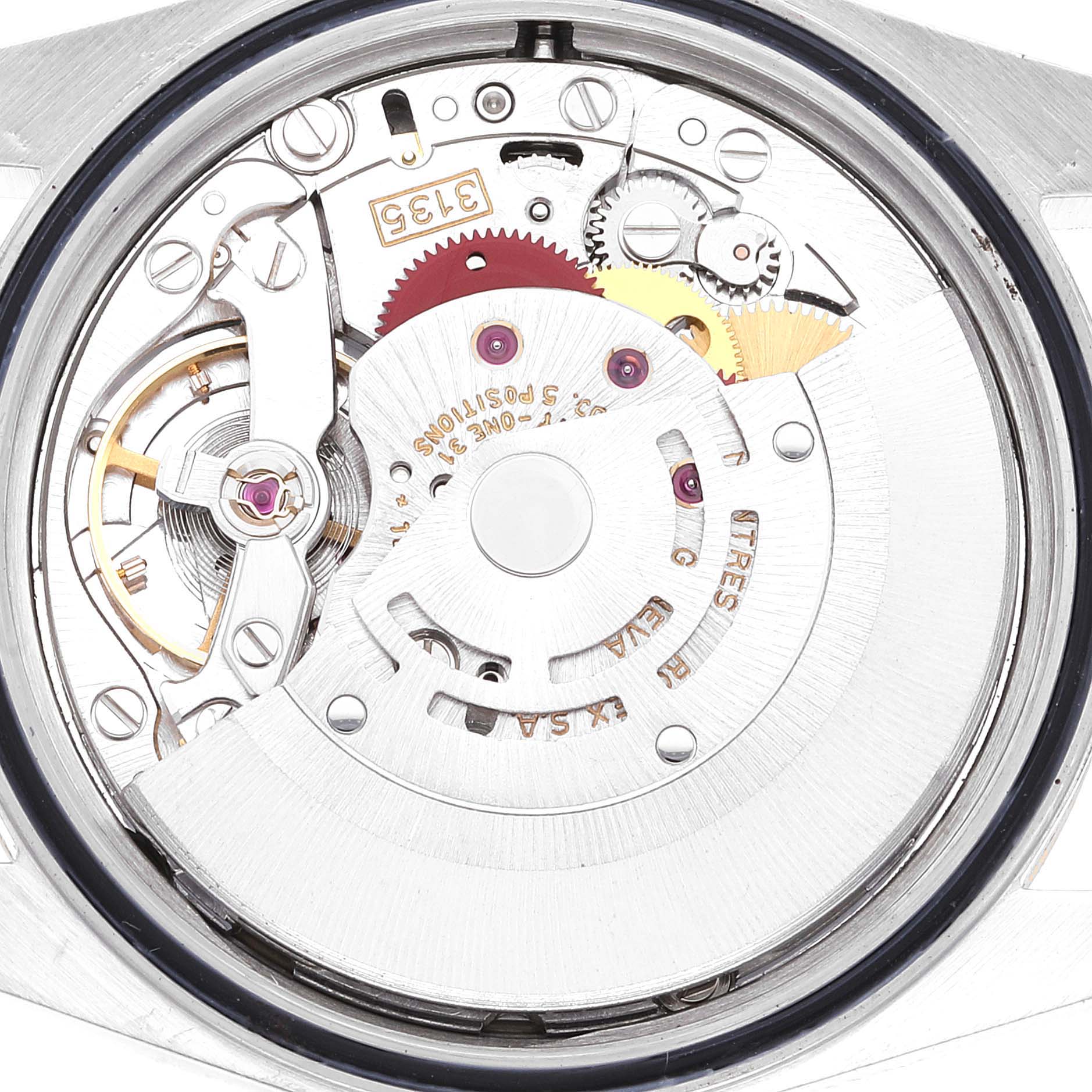 This image shows the intricate internal mechanism of the Rolex Datejust 16233 Men's Steel and Gold (two tone) Champagne Dial 16233 Men's Steel and Gold (two tone) Champagne Dial watch from a rear angle.