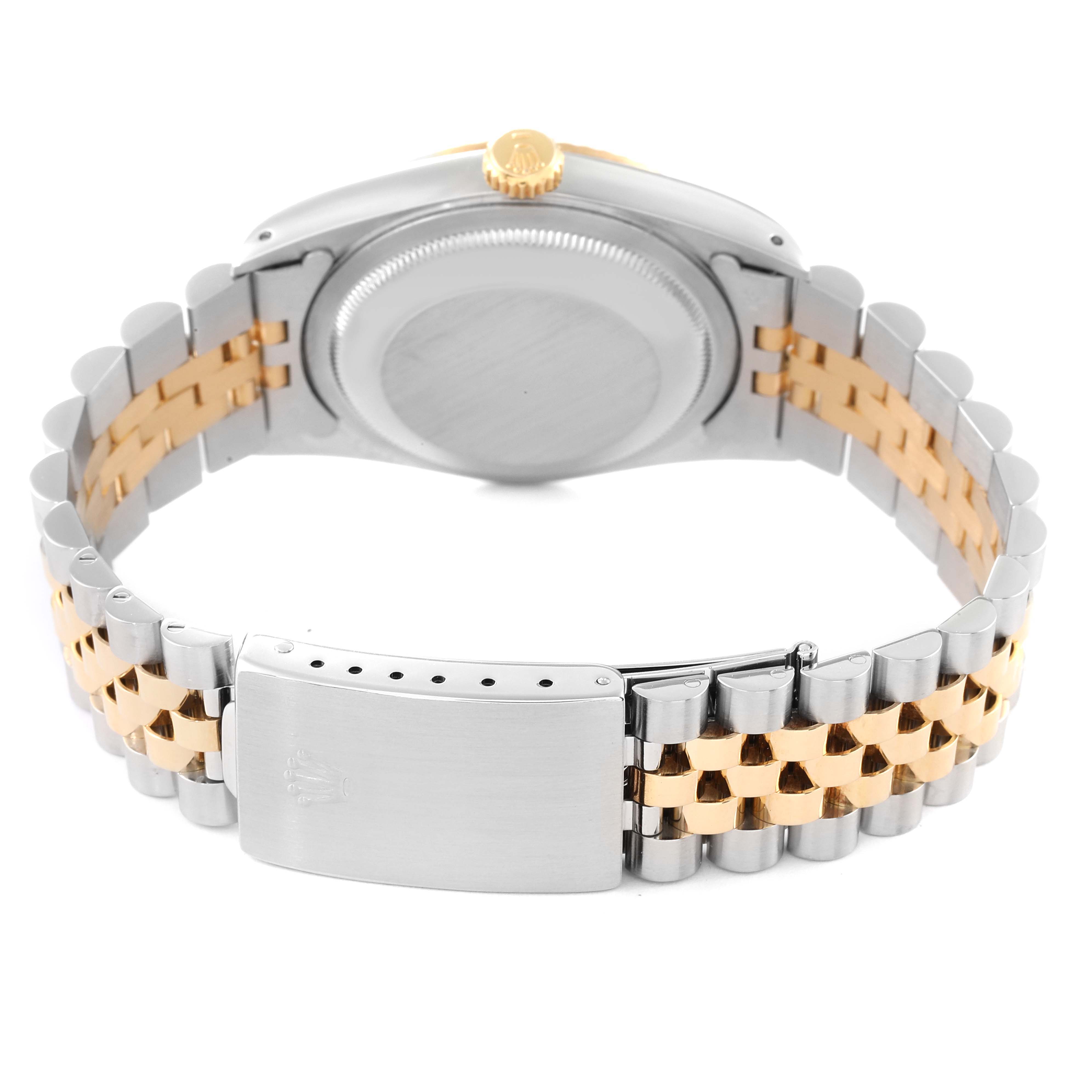 The image shows the back case and bracelet of a Rolex Datejust 16233 Men's Steel and Gold (two tone) Champagne Dial 16233 Men's Steel and Gold (two tone) Champagne Dial watch from a rear angle.