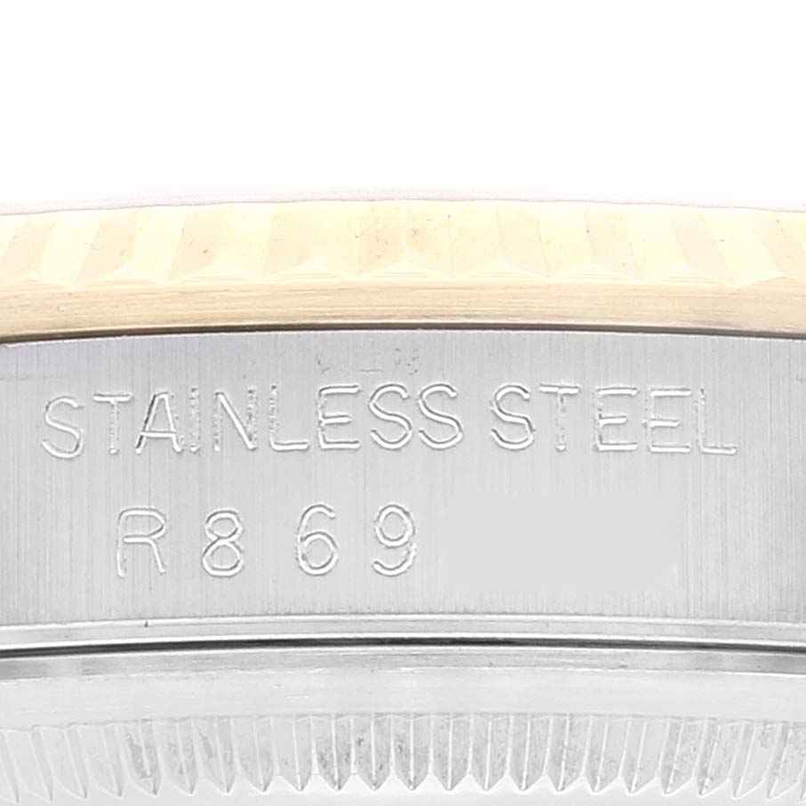 This image shows a close-up of the stainless steel case back of a Rolex Datejust 16233 Men's Steel and Gold (two tone) Champagne Dial 16233 Men's Steel and Gold (two tone) Champagne Dial watch.