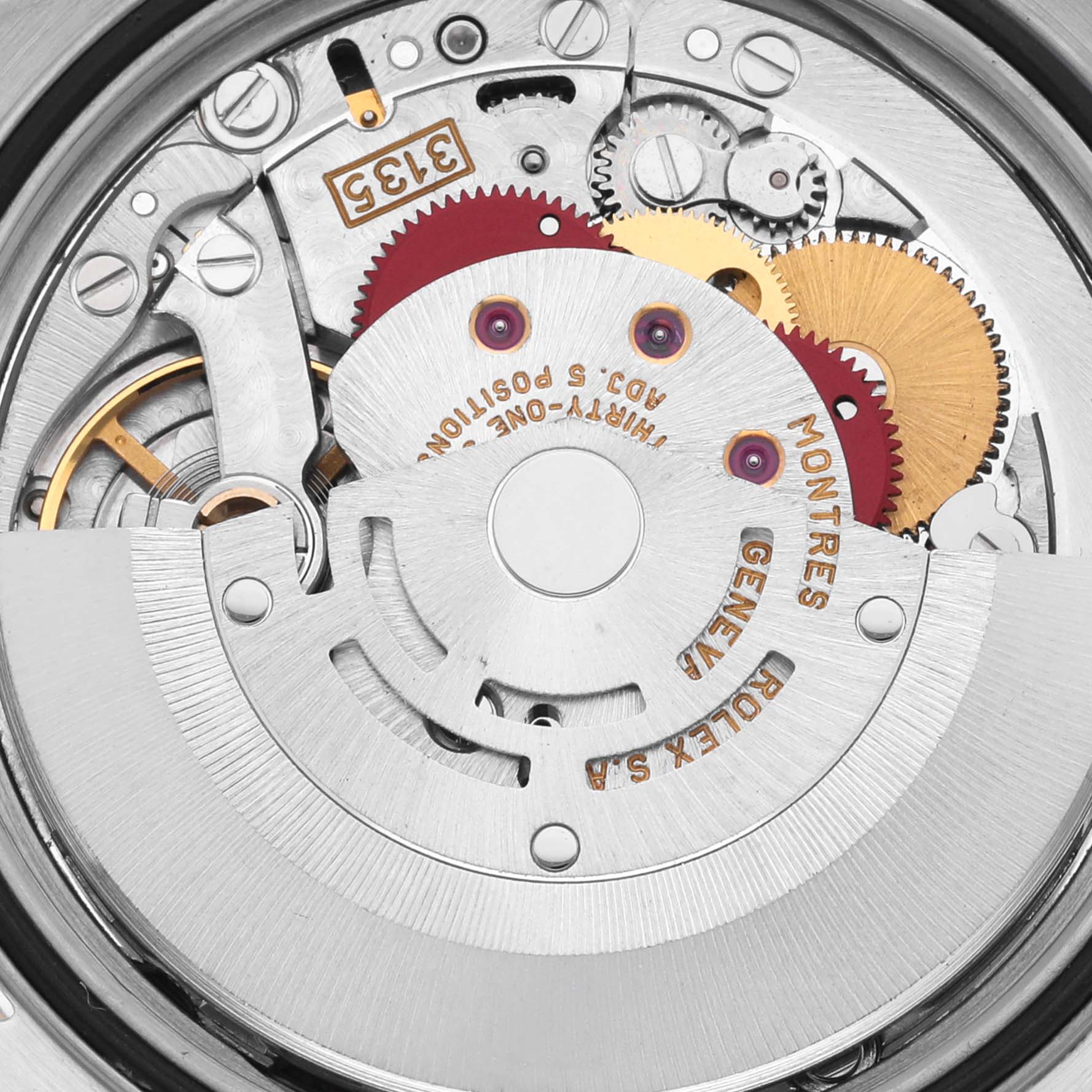 The image shows the inner mechanical movement of a Rolex Datejust 16233 Men's Steel and Gold (two tone) White Dial 16233 Men's Steel and Gold (two tone) White Dial, highlighting gears and components from a top-down angle.
