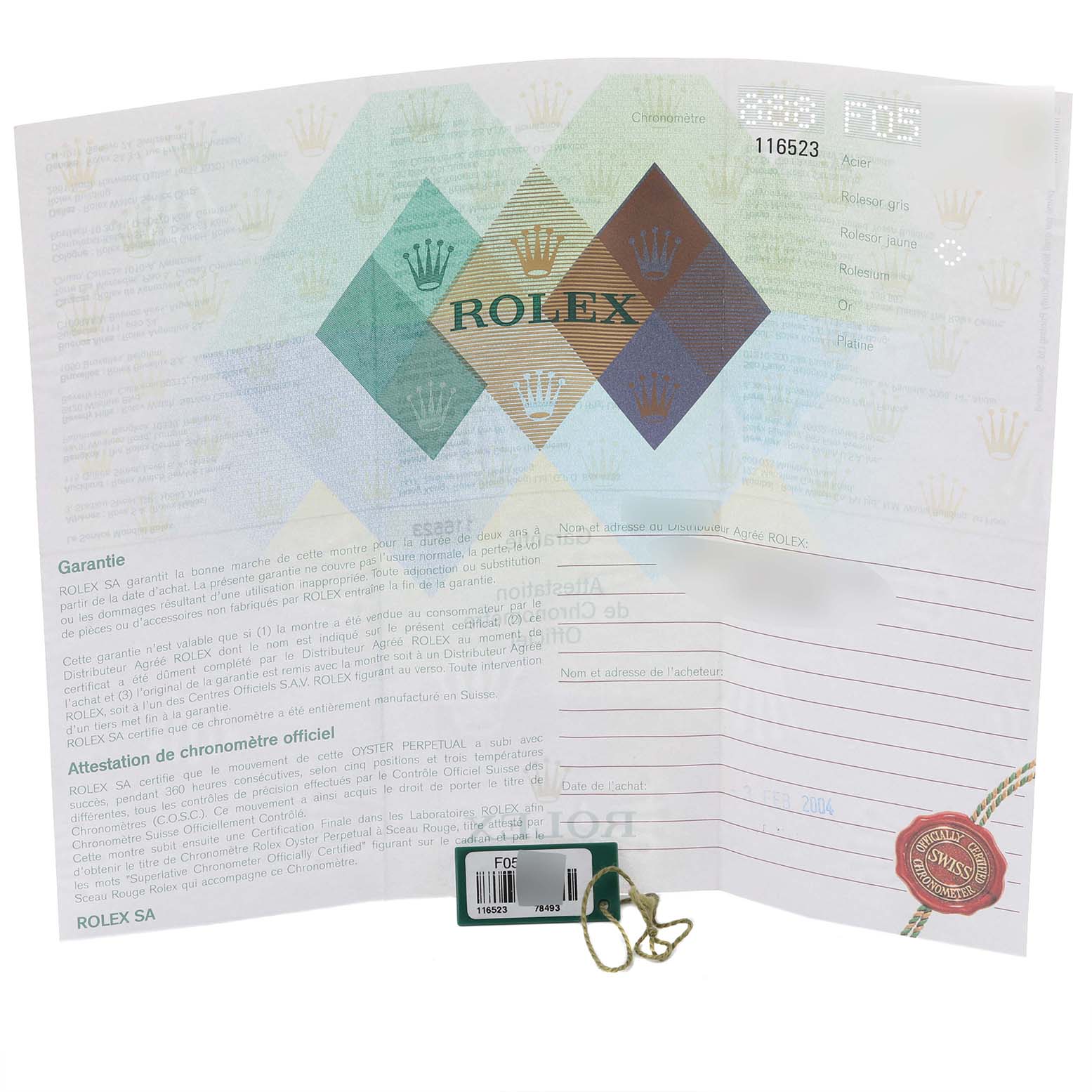 The image shows the warranty papers and tag for a Rolex Daytona 116523 Men's Steel and Gold (two tone) Black Dial 116523 Men's Steel and Gold (two tone) Black Dial watch.