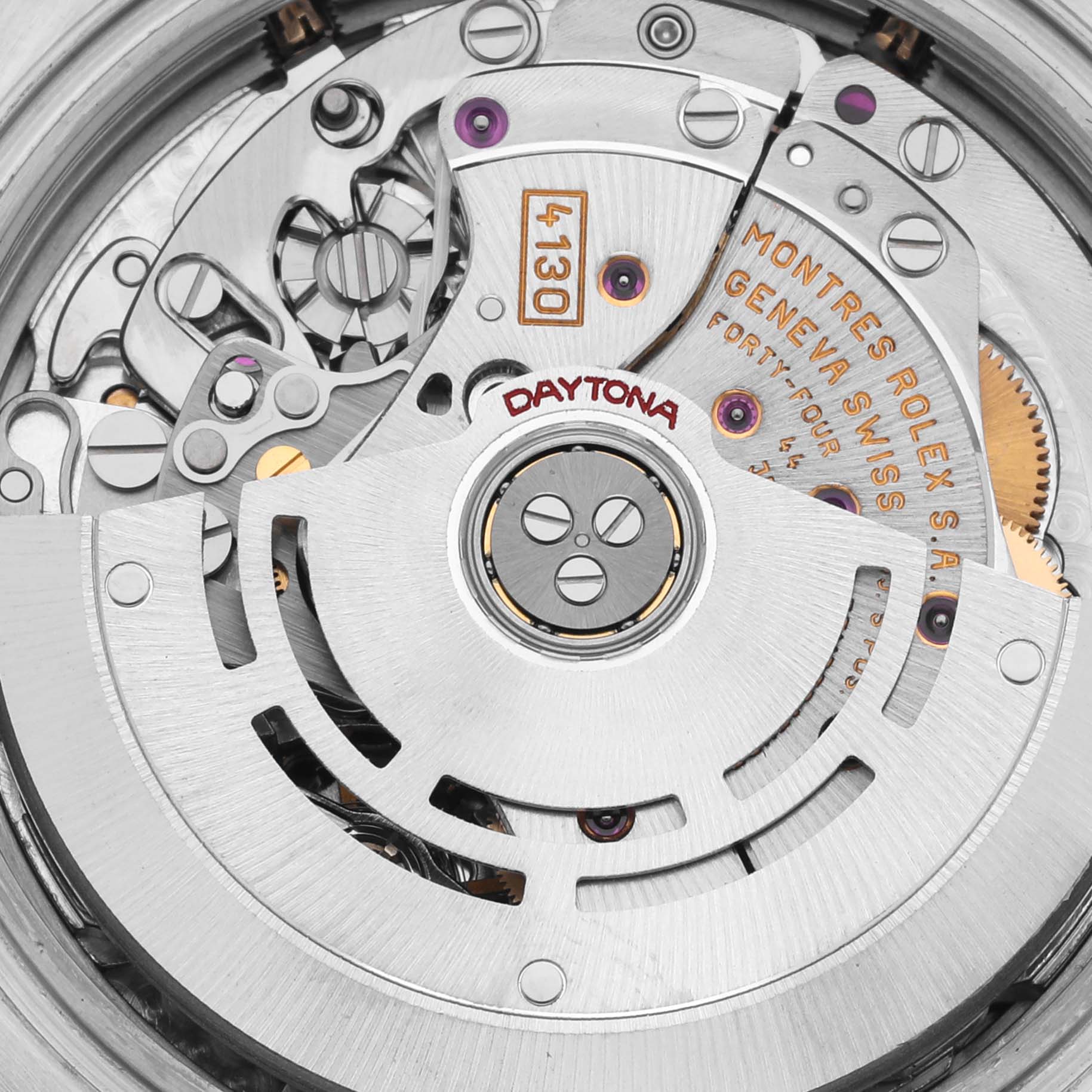 The image shows the intricate movement mechanism of a Rolex Daytona 116523 Men's Steel and Gold (two tone) Black Dial 116523 Men's Steel and Gold (two tone) Black Dial watch from the back angle.