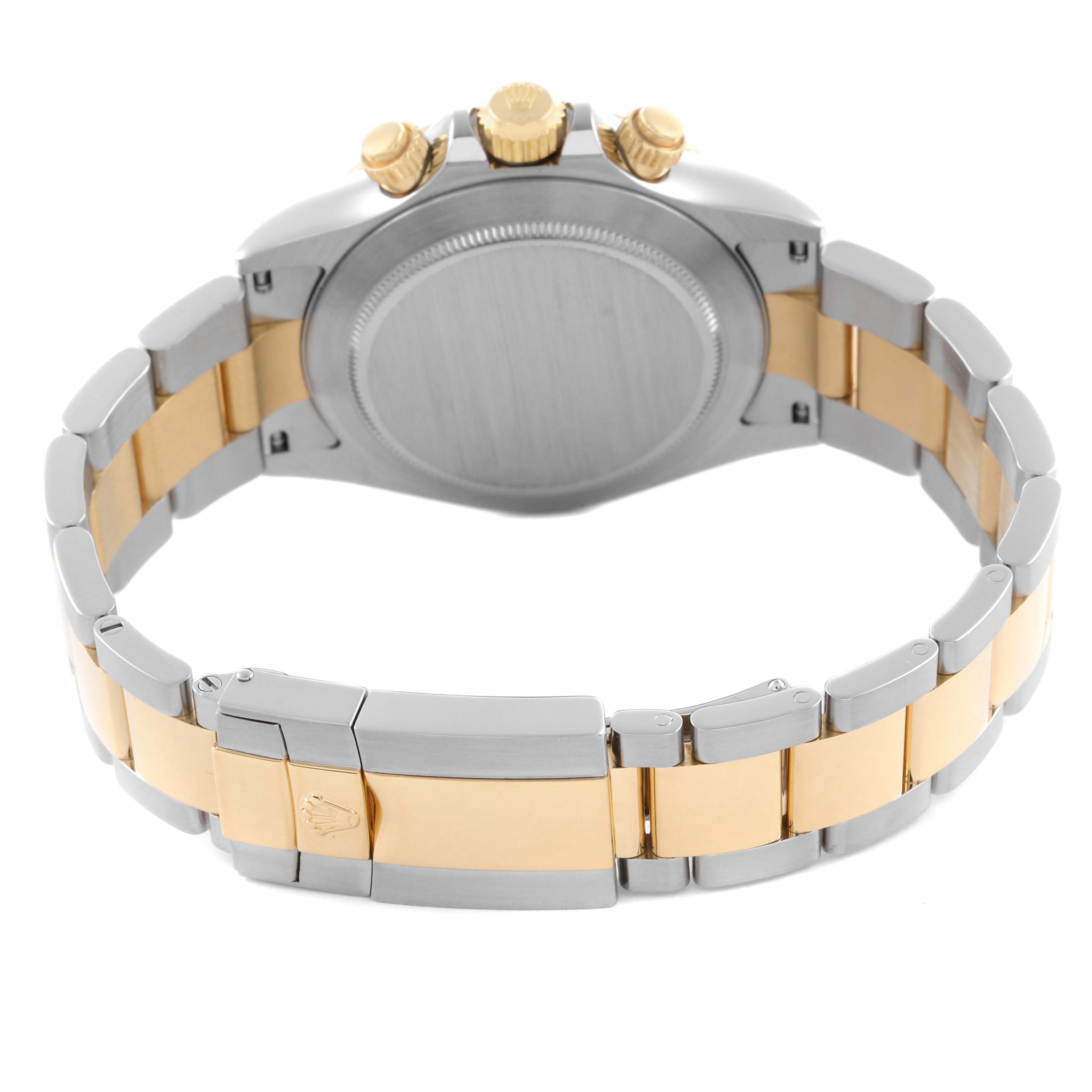 This image shows the back case and bracelet of a Rolex Daytona 116523 Men's Steel and Gold (two tone) Black Dial 116523 Men's Steel and Gold (two tone) Black Dial, highlighting the two-tone band and clasp.