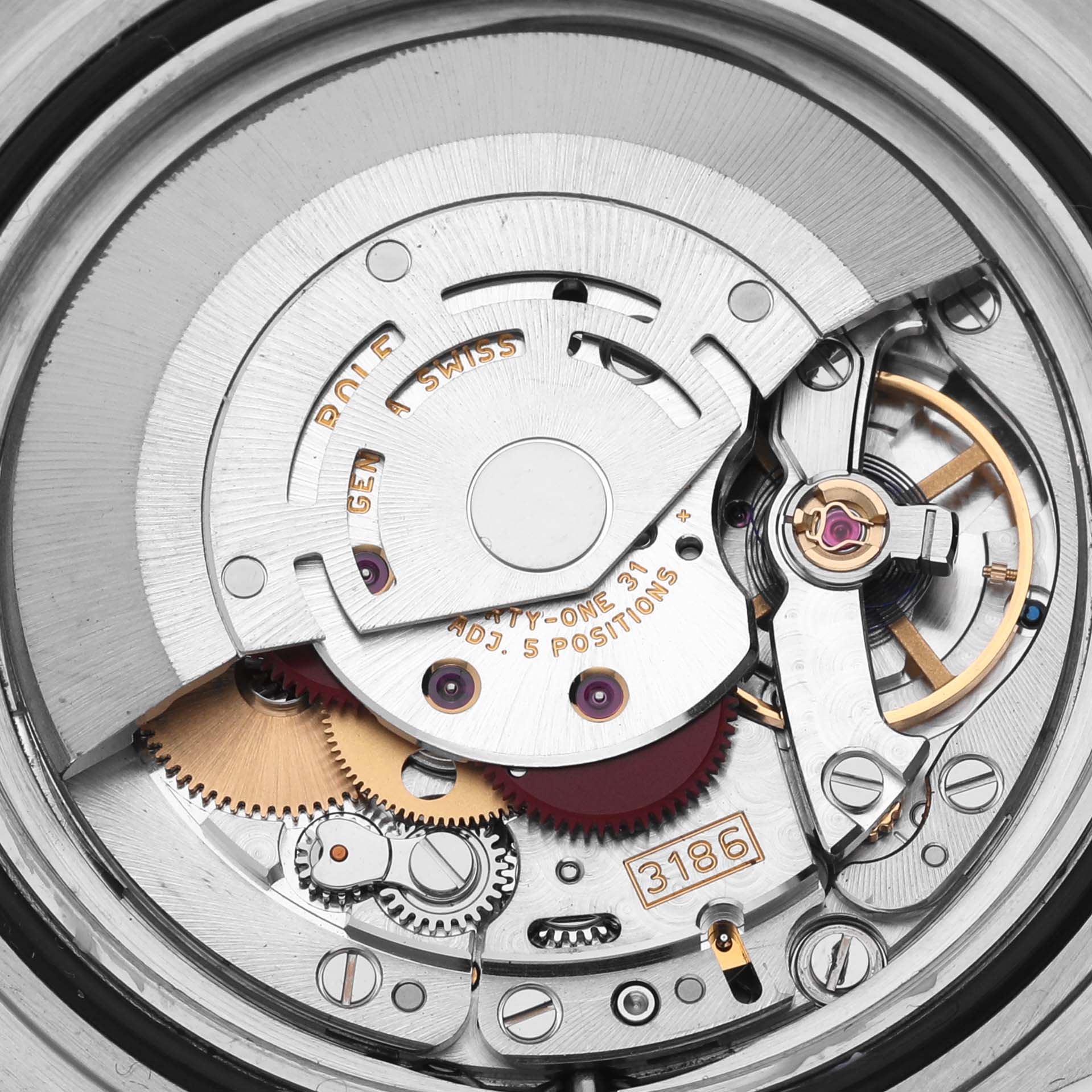 The image shows a close-up of the movement of the Rolex Explorer 16570T Men
s Stainless Steel Black Dial 16570T Men
s Stainless Steel Black Dial, highlighting its intricate mechanical parts.