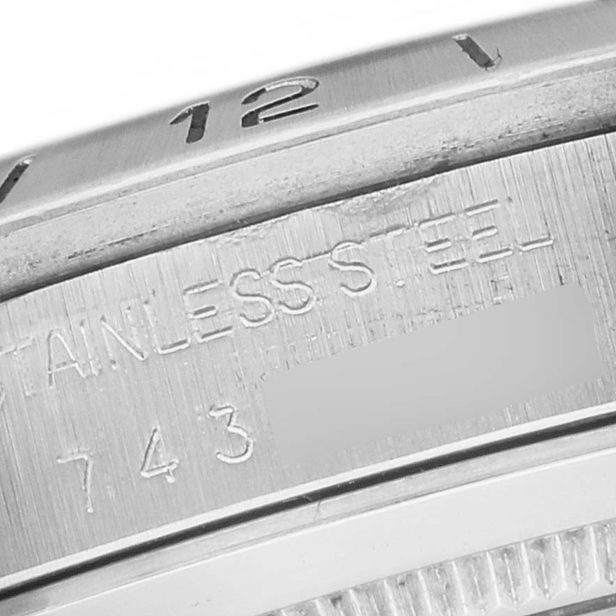 The image shows a close-up of the side engraving on a stainless steel Rolex Vintage Collection 1655 Men's Stainless Steel Black Dial 1655 Men's Stainless Steel Black Dial watch case.