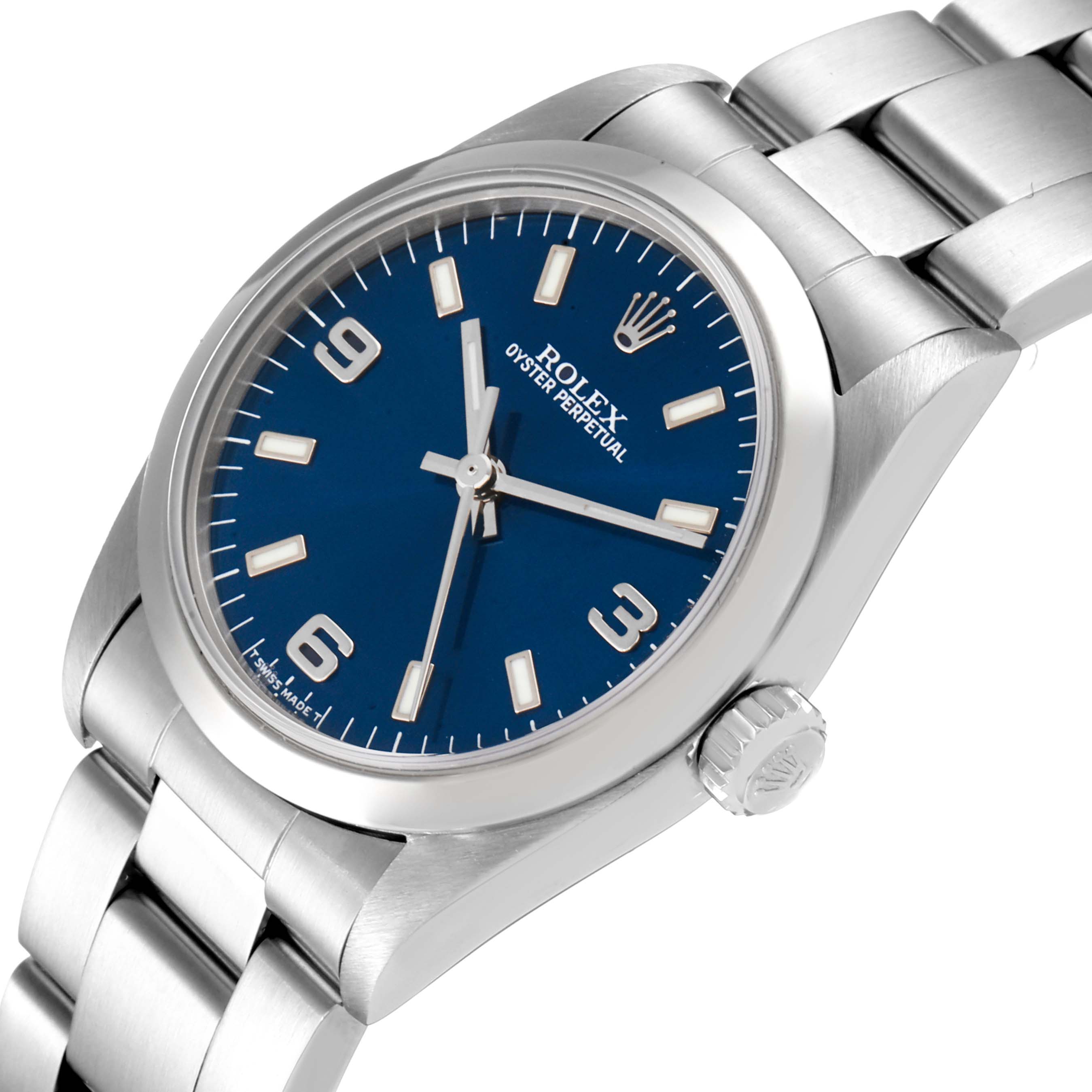 The image shows a side angle view of a Mid-Size Rolex Oyster Perpetual watch, highlighting the face, bezel, and bracelet.