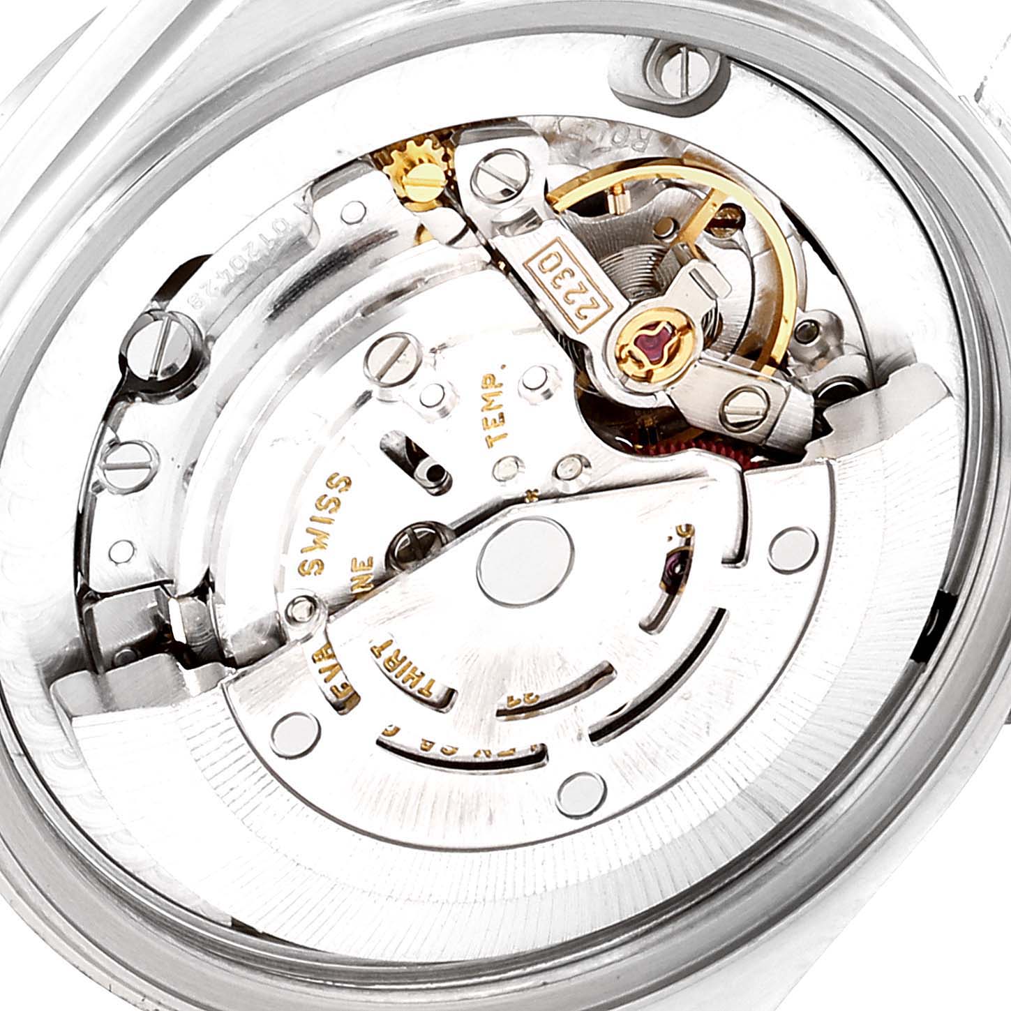 The image shows a close-up view of the internal mechanism of a Mid-Size Rolex watch, highlighting the intricate gears and components.