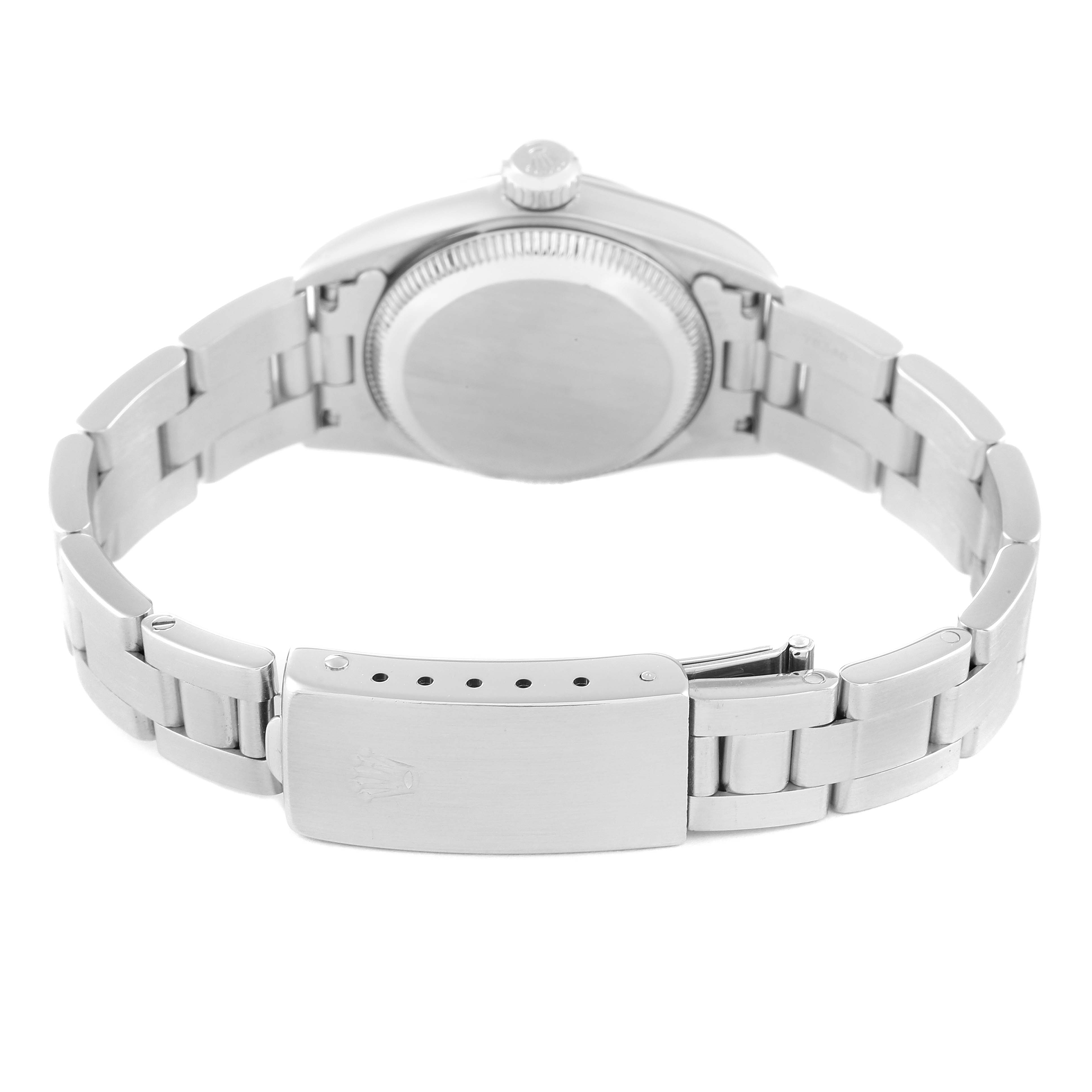 The photo shows the back side and bracelet of a Rolex Oyster Perpetual 67194 Women
s Stainless Steel Silver Dial 67194 Women
s Stainless Steel Silver Dial watch with the clasp visible.