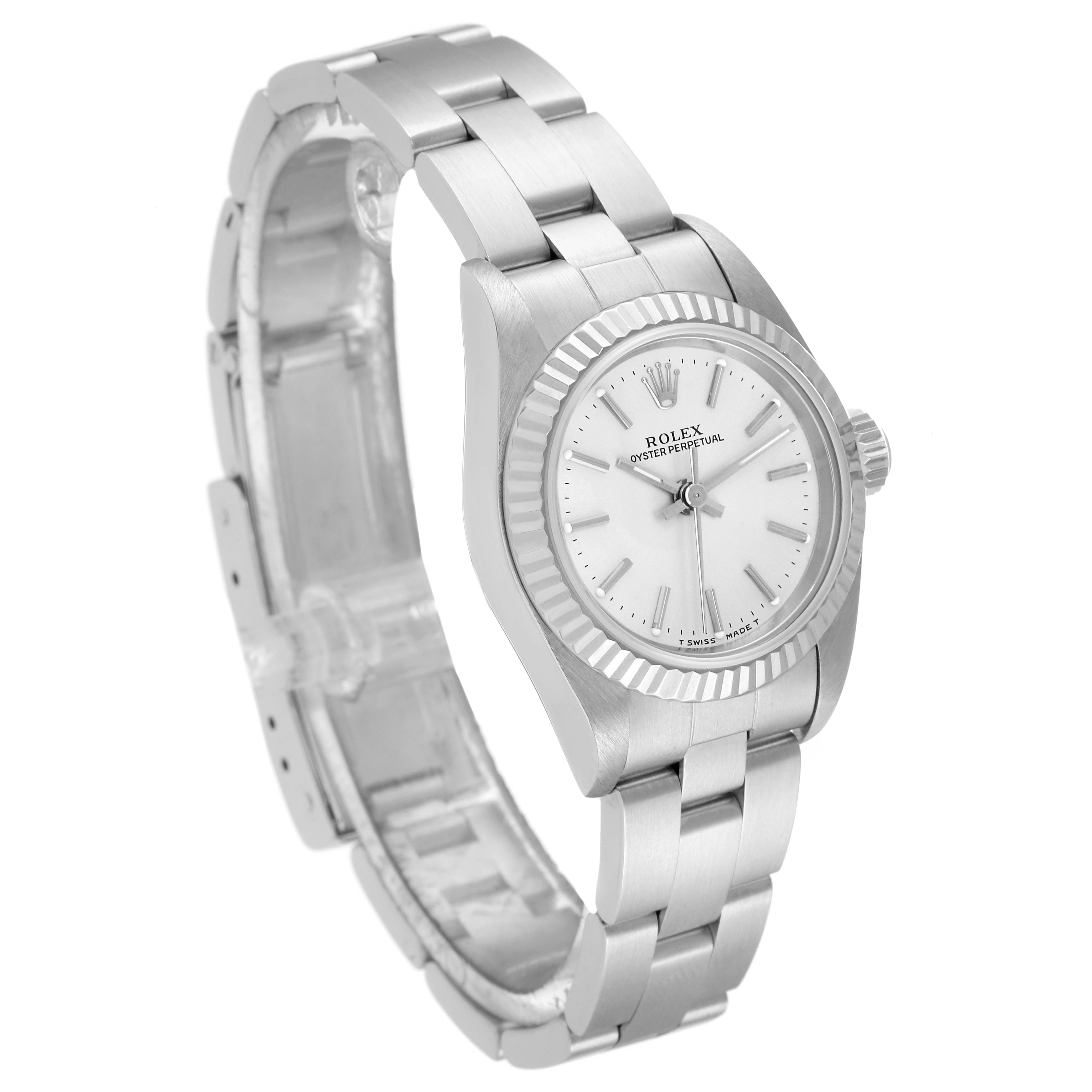 The Rolex Oyster Perpetual 67194 Women
s Stainless Steel Silver Dial 67194 Women
s Stainless Steel Silver Dial watch is shown from a three-quarter angle, highlighting its face, bezel, and bracelet.