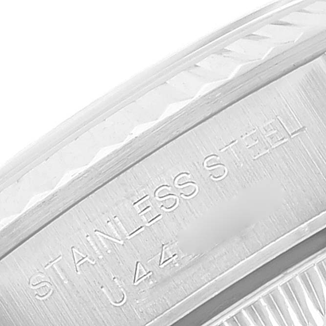 The image shows a close-up of the side of a Rolex Oyster Perpetual 67194 Women
s Stainless Steel Silver Dial 67194 Women
s Stainless Steel Silver Dial watch, highlighting the stainless steel engraving.
