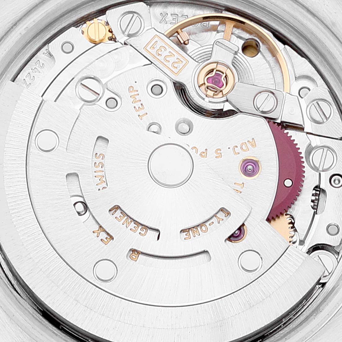 This image shows an internal view of the Rolex Oyster Perpetual 176210 Women's Stainless Steel White Dial 176210 Women's Stainless Steel White Dial model's automatic movement mechanism.