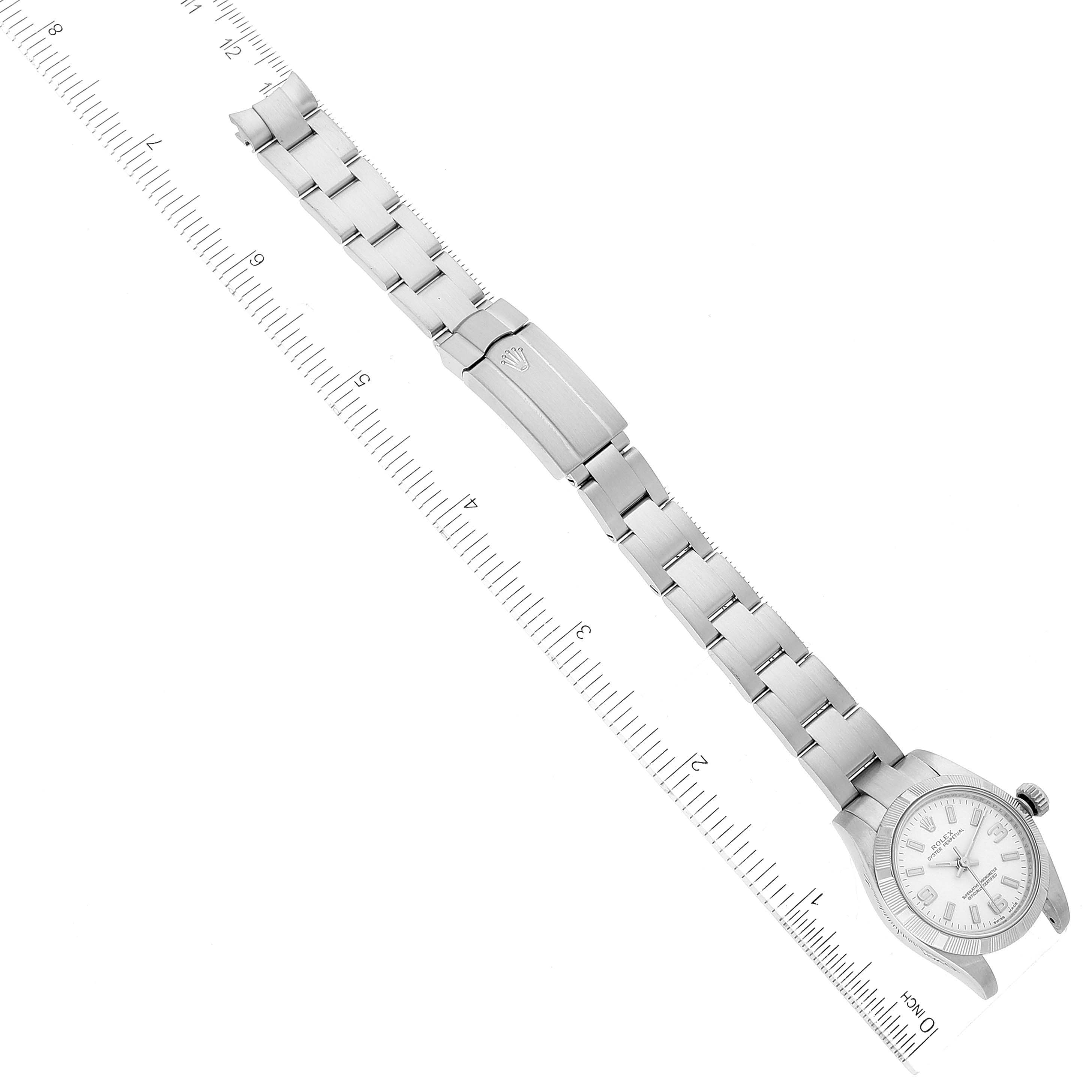 The image shows a top-down view of a Rolex Oyster Perpetual 176210 Women's Stainless Steel White Dial 176210 Women's Stainless Steel White Dial watch, including the face, bezel, bracelet, and clasp.