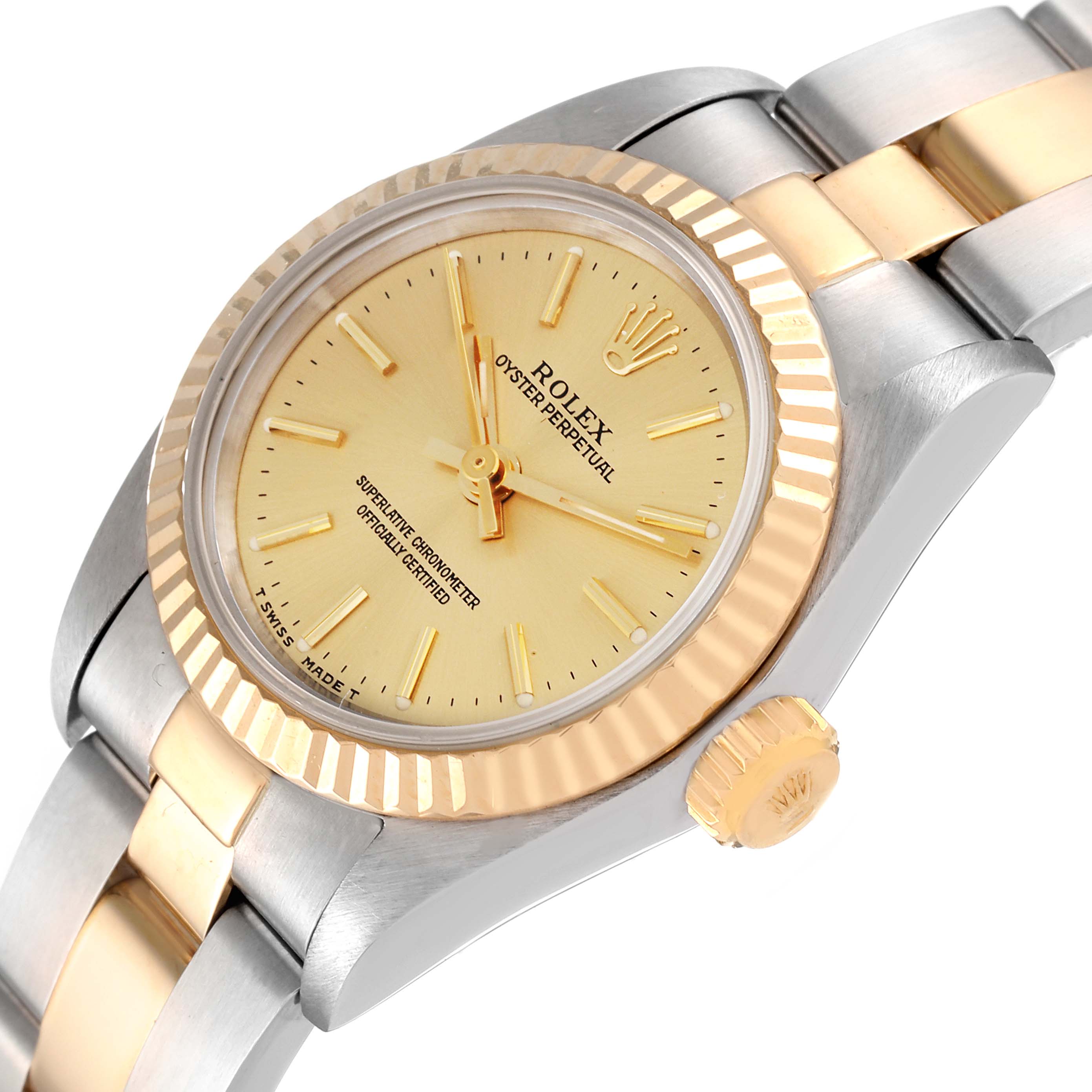 The image shows a close-up, angled view of a Rolex Oyster Perpetual 67193 Women's Steel and Gold (two tone) Champagne Dial 67193 Women's Steel and Gold (two tone) Champagne Dial watch, highlighting its dial, bezel, crown, and part of the bracelet.