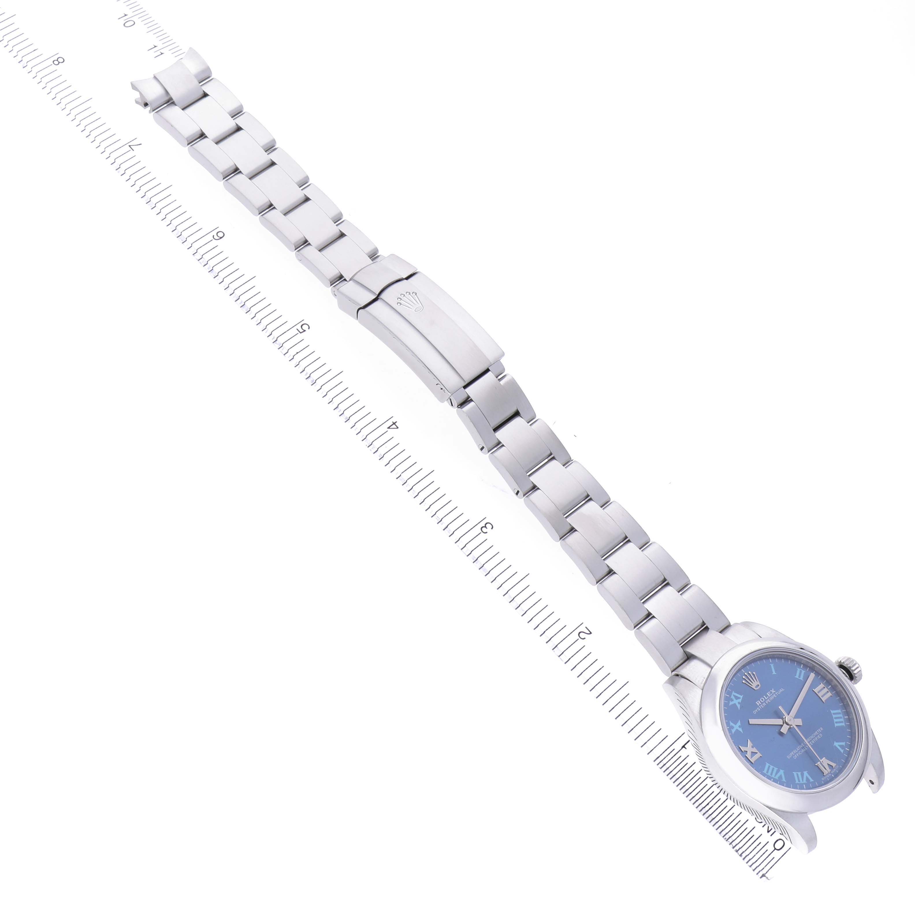 The Rolex Mid-Size 177200 Women's Stainless Steel Blue Dial 177200 Women's Stainless Steel Blue Dial watch is shown at an oblique angle, highlighting the bracelet, clasp, and blue dial.