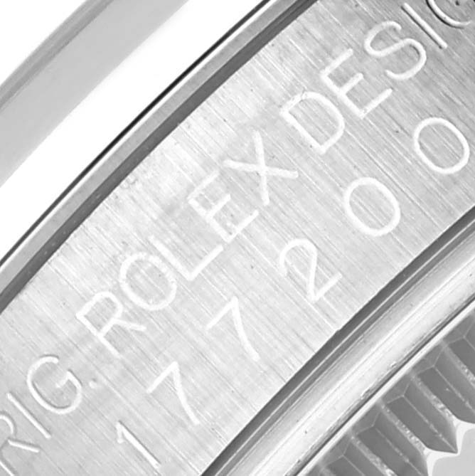 The image shows a close-up of the engraving on the bezel of a Rolex Mid-Size 177200 Women's Stainless Steel Blue Dial 177200 Women's Stainless Steel Blue Dial model watch.