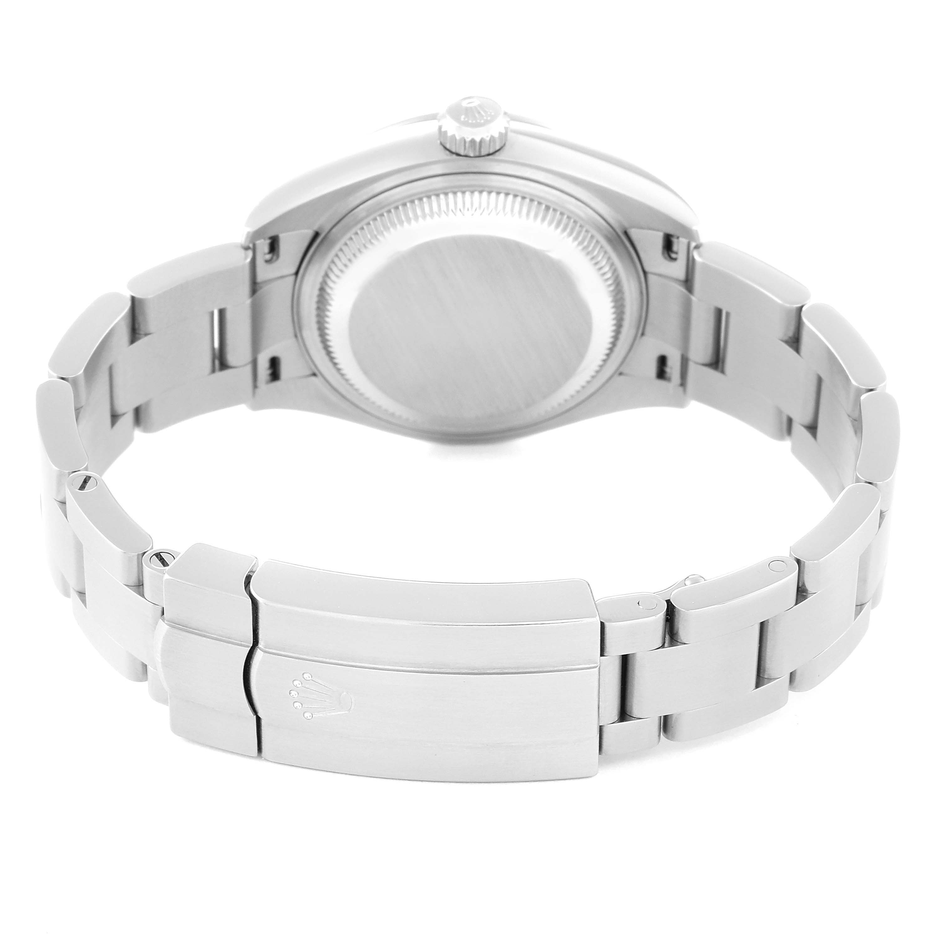 This image shows the back case and clasp of a Rolex Oyster Perpetual 276200 Women's Stainless Steel Blue Dial 276200 Women's Stainless Steel Blue Dial watch.