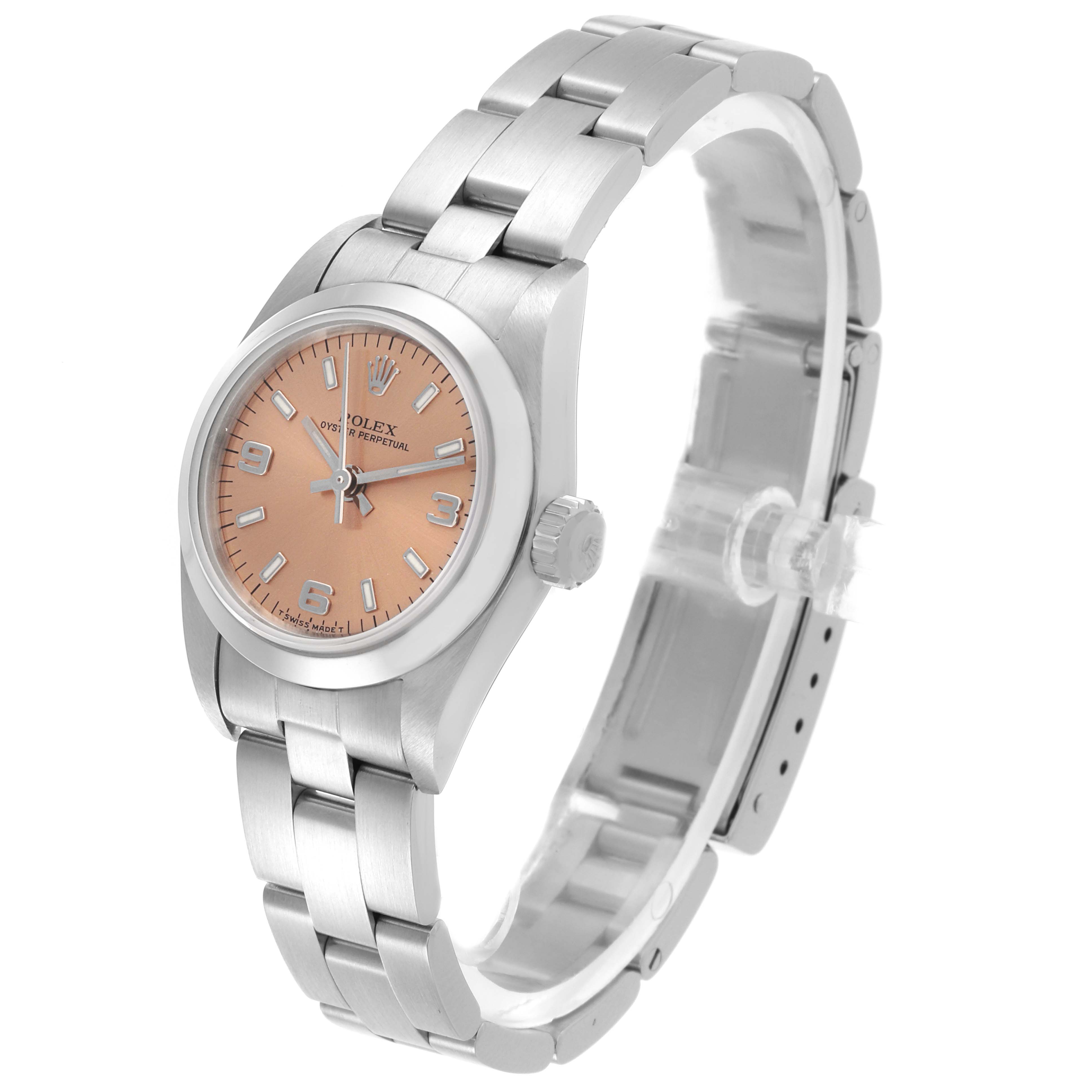 The Rolex Oyster Perpetual 67180 Women's Stainless Steel Pink Dial 67180 Women's Stainless Steel Pink Dial watch is shown at a slight angle, highlighting the dial, bezel, crown, and bracelet.