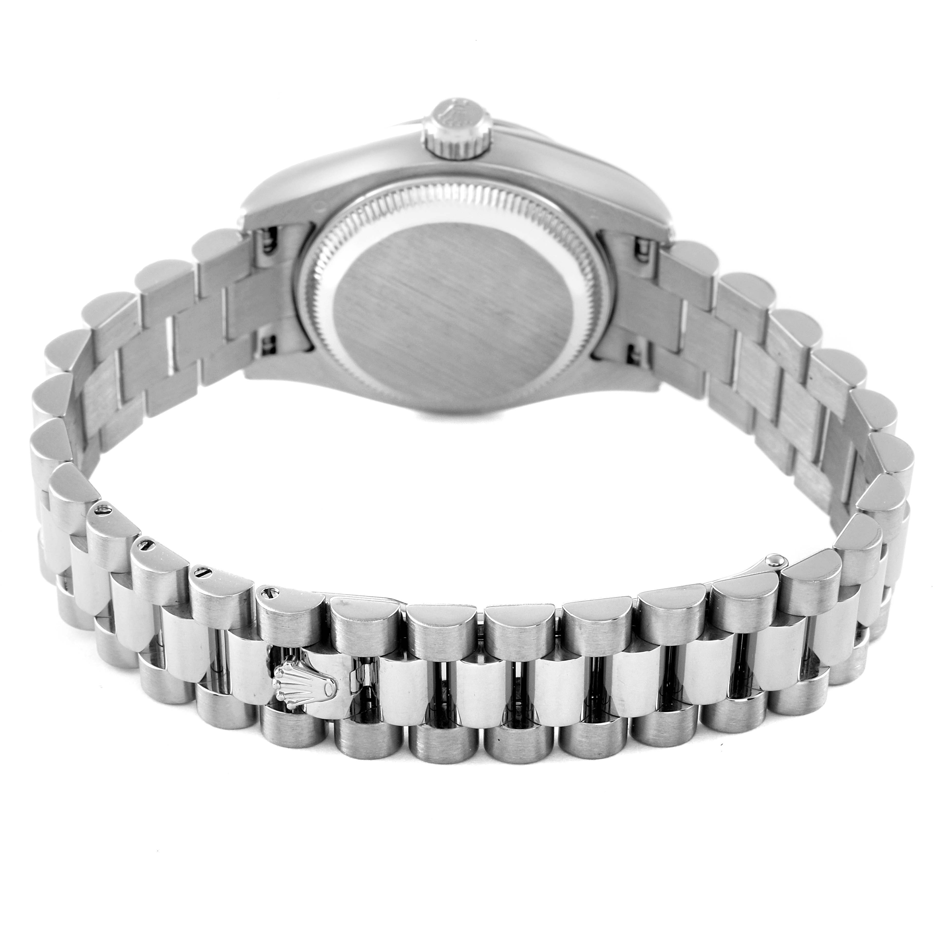 This image shows the back of the case and the bracelet of a Rolex President 179239 Women's White Gold Mother of Pearl Dial 179239 Women's White Gold Mother of Pearl Dial model watch.