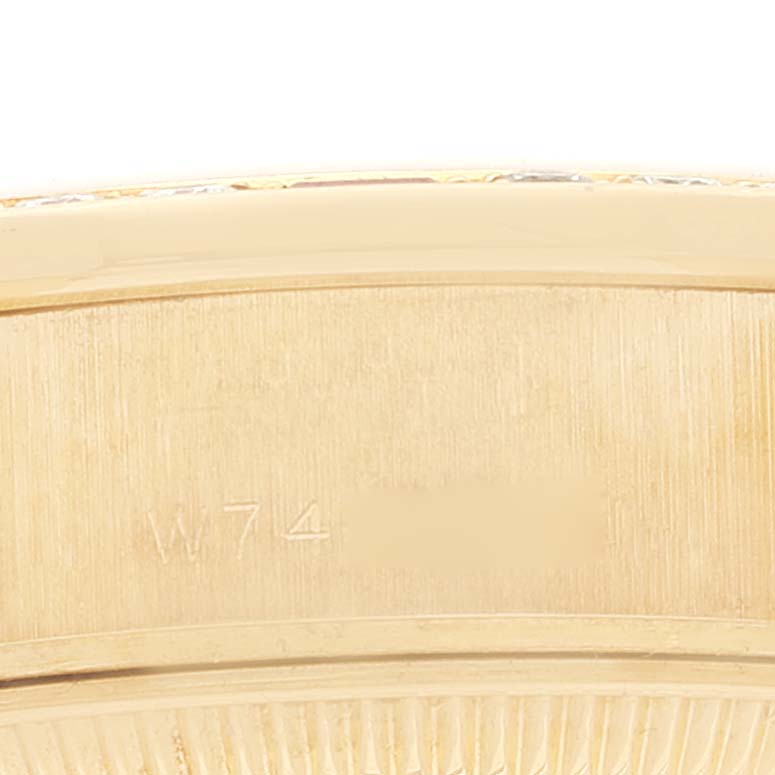 The image shows a close-up of the edge of the case or bezel of a Rolex President 69068 Women's Yellow Gold Mother of Pearl Dial 69068 Women's Yellow Gold Mother of Pearl Dial model watch.