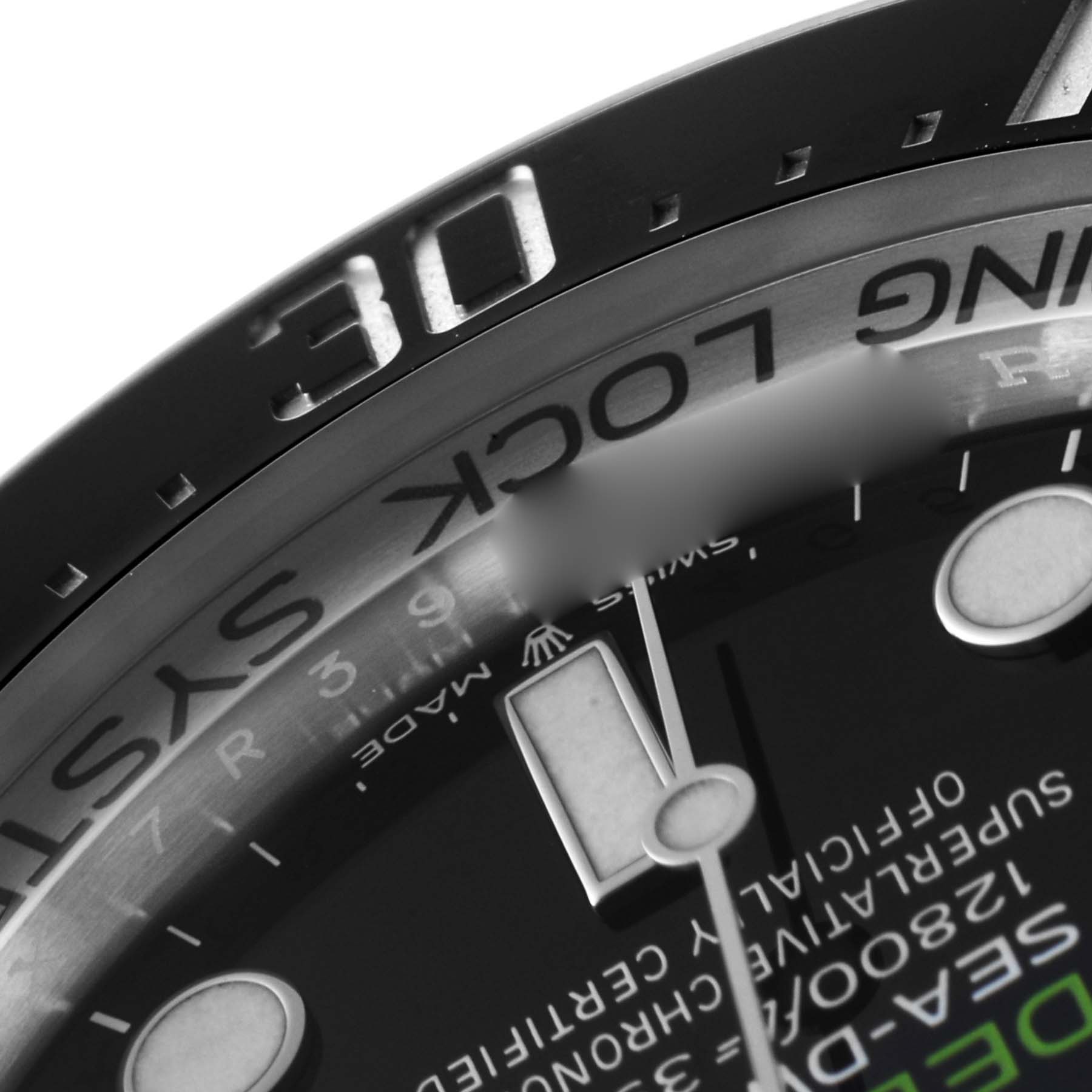 The image shows a close-up angle of the Rolex Sea-Dweller 126660 Men
s Stainless Steel Blue Dial 126660 Men
s Stainless Steel Blue Dial
s dial and partially the bezel with the "30" minute marker.