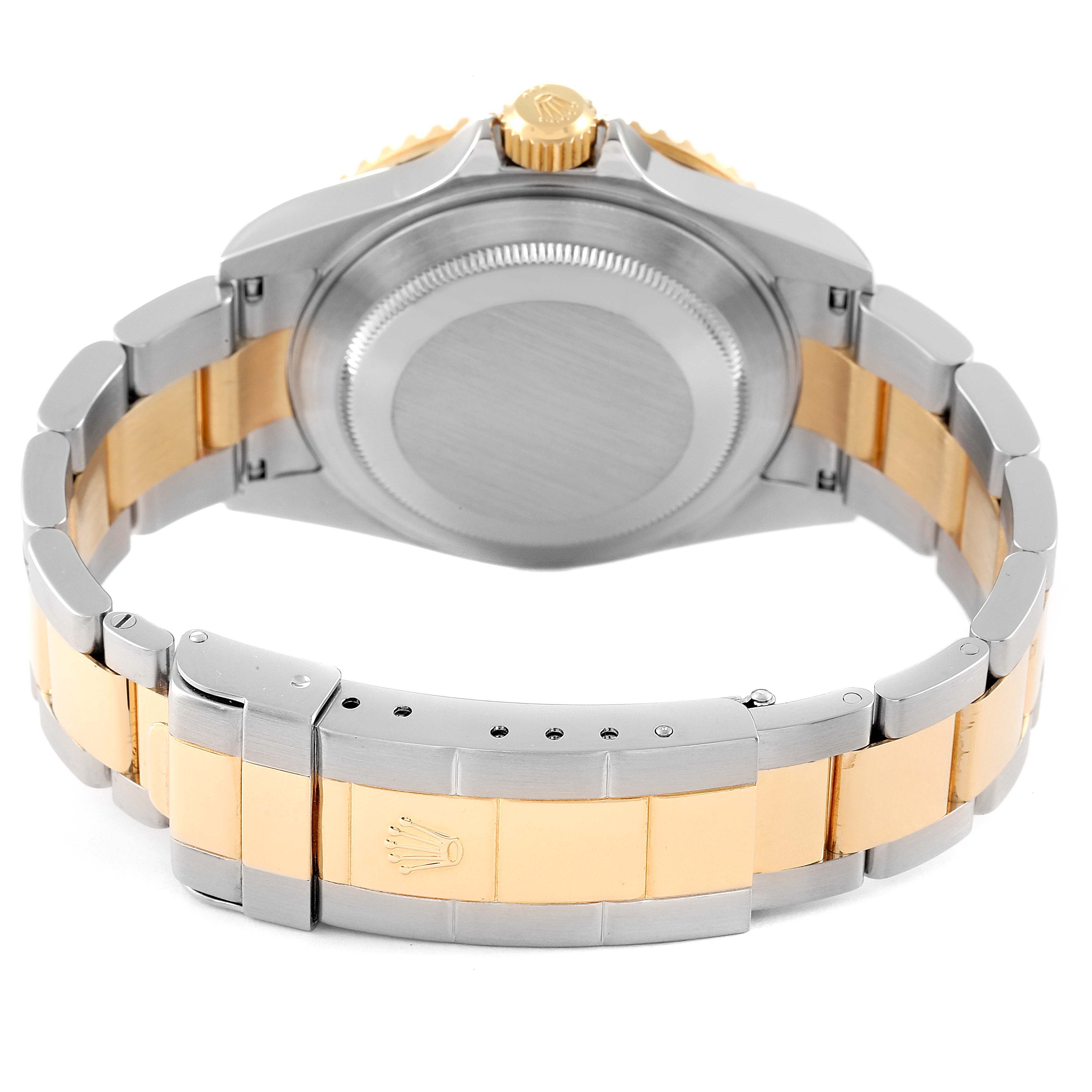 This is the rear view of a Rolex Submariner 16613 Men's Steel and Gold (two tone) Blue Dial 16613 Men's Steel and Gold (two tone) Blue Dial, showing the clasp, bracelet, bezel, and case back.