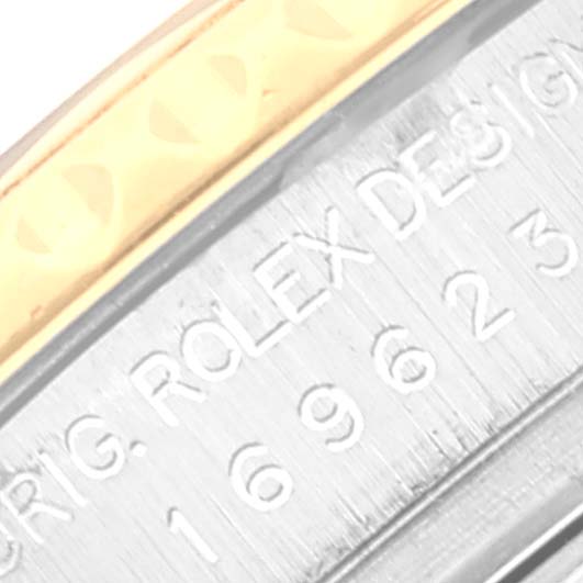 This close-up image shows the side engraving and part of the bezel of the Rolex Yacht-Master 169623 Women's Steel and Gold (two tone) Grey Dial 169623 Women's Steel and Gold (two tone) Grey Dial watch model.