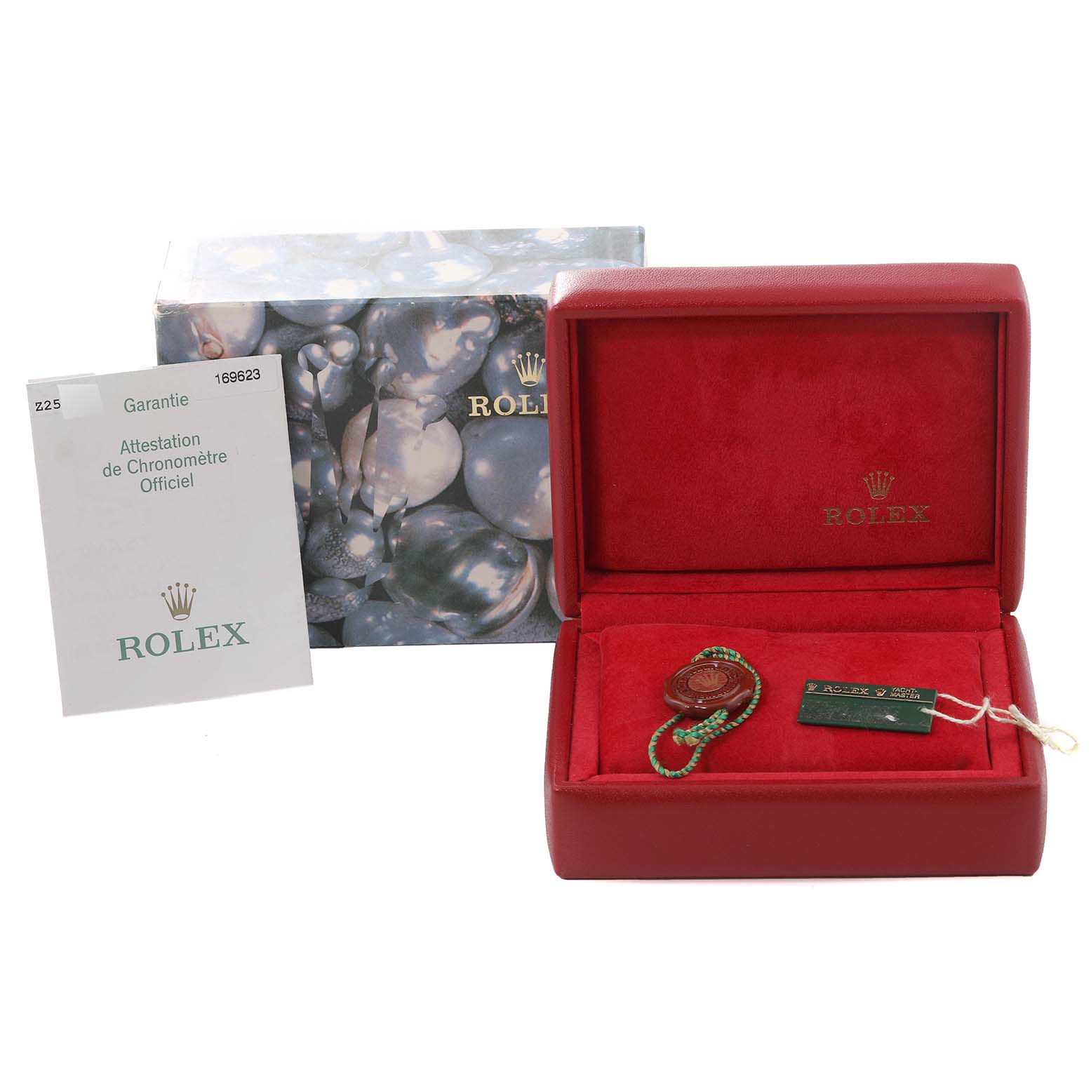 The image shows a Rolex Yacht-Master 169623 Women's Steel and Gold (two tone) Grey Dial 169623 Women's Steel and Gold (two tone) Grey Dial watch's packaging, including a red box, certificate, and tags.