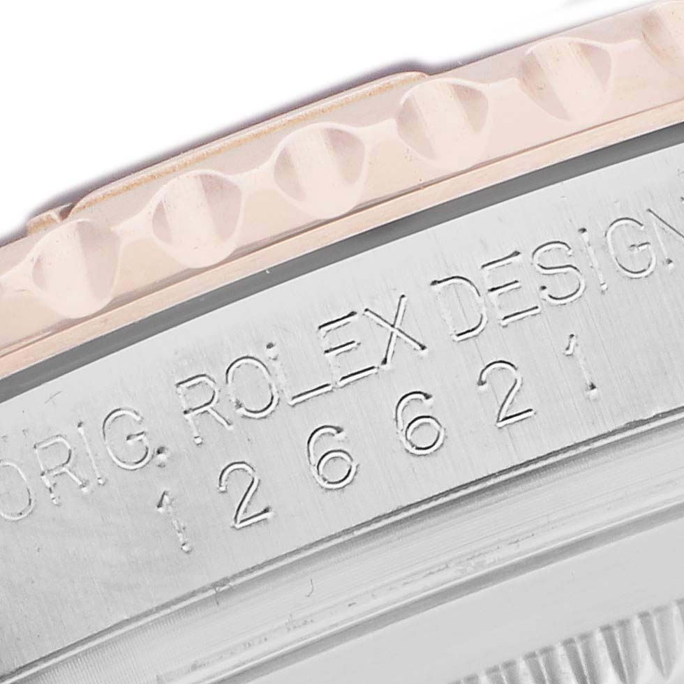 The image shows a close-up of the case side, featuring the bezel and model number of the Rolex Yacht-Master 126621 Men's Steel and Gold (two tone) Black Dial.
