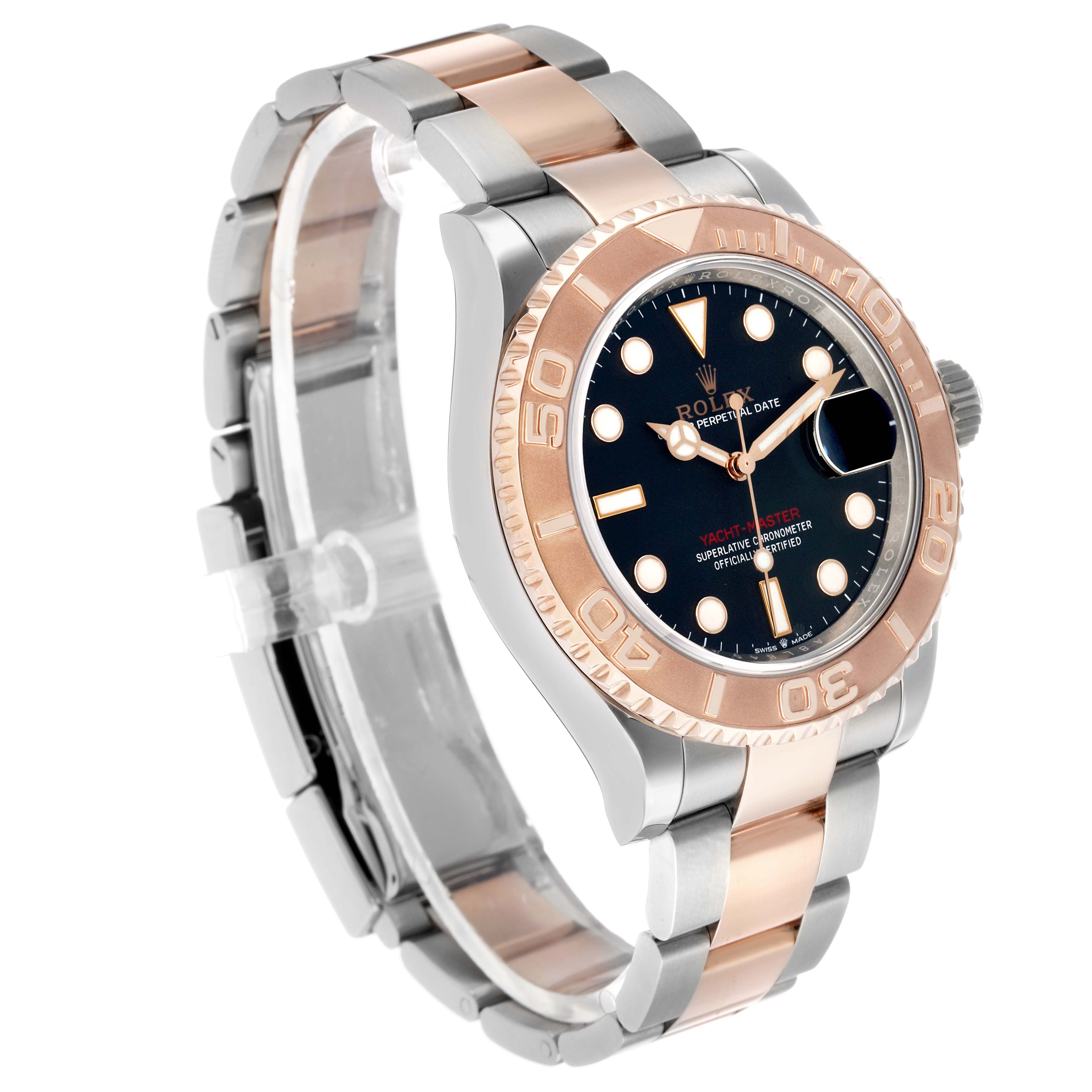 The Rolex Yacht-Master 126621 Men's Steel and Gold (two tone) Black Dial watch is shown at a three-quarter angle, displaying the face, bezel, and bracelet.