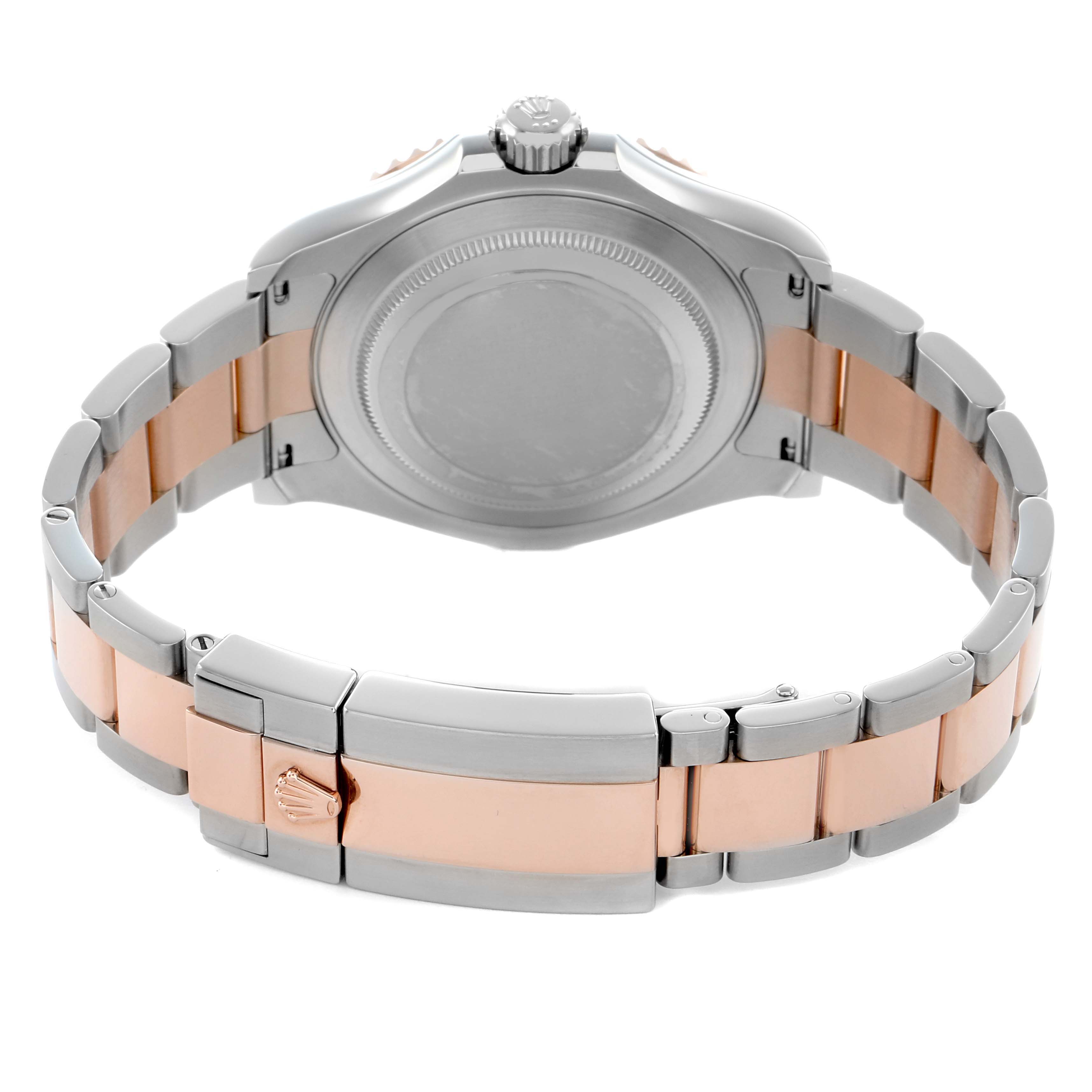The image shows the back view of a Rolex Yacht-Master 126621 Men's Steel and Gold (two tone) Black Dial watch, highlighting the bracelet and clasp.