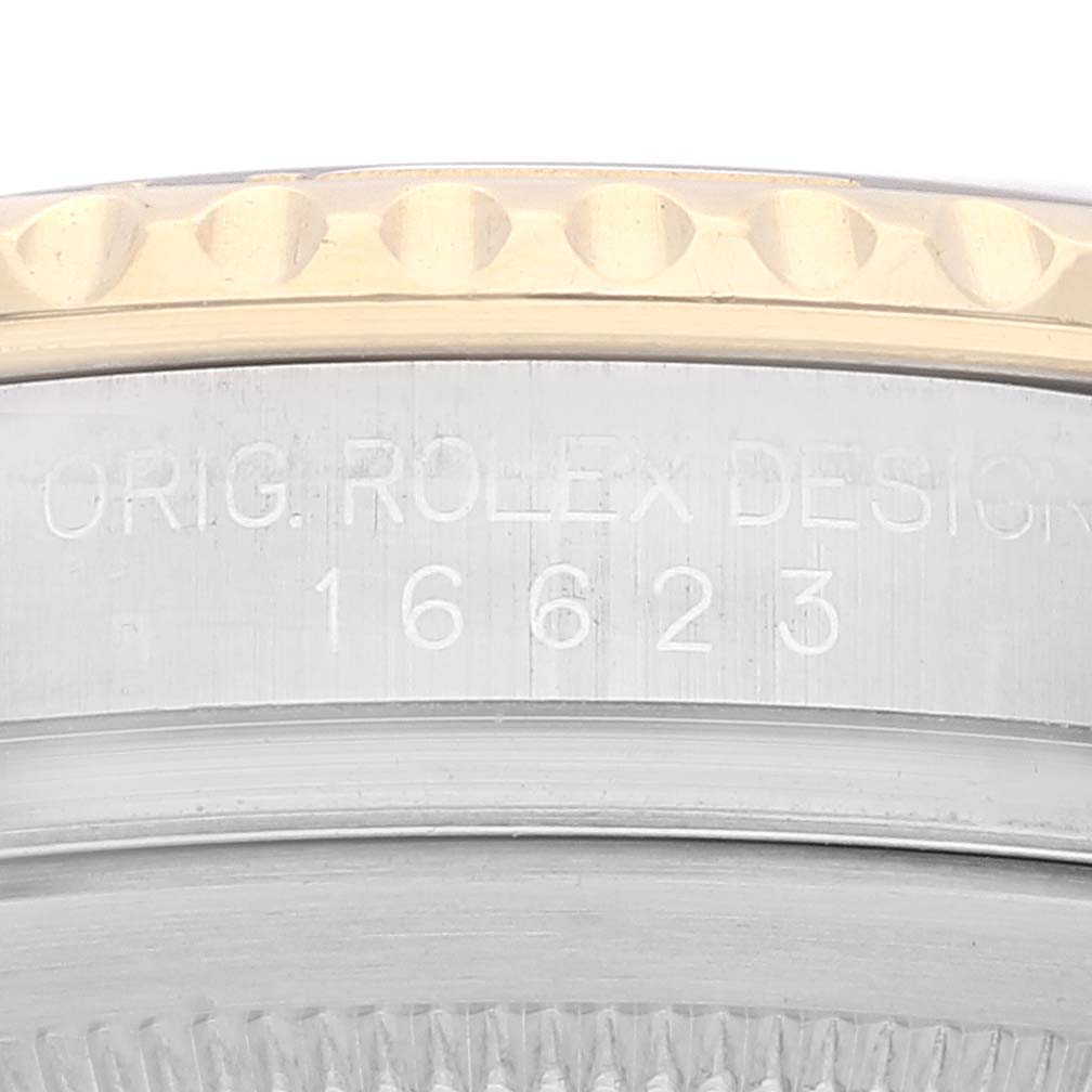 This image shows a close-up view of the engraved model number "16623" on the side of a Rolex Yacht-Master 16623 Men
s Stainless Steel White Dial 16623 Men
s Stainless Steel White Dial watch bezel.
