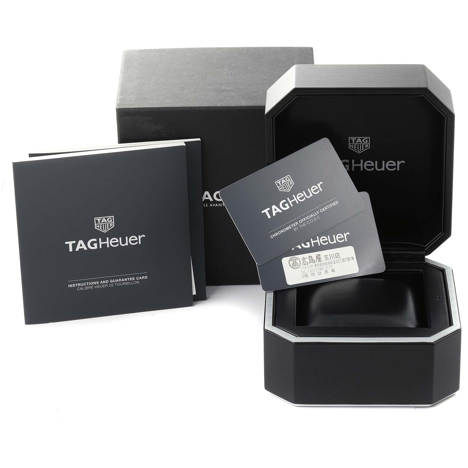 The image shows the box, instruction manuals, and warranty cards for a Tag Heuer Carrera CAR5A8Y.FC6377 Men's Titanium Black Dial CAR5A8Y.FC6377 Men's Titanium Black Dial watch.