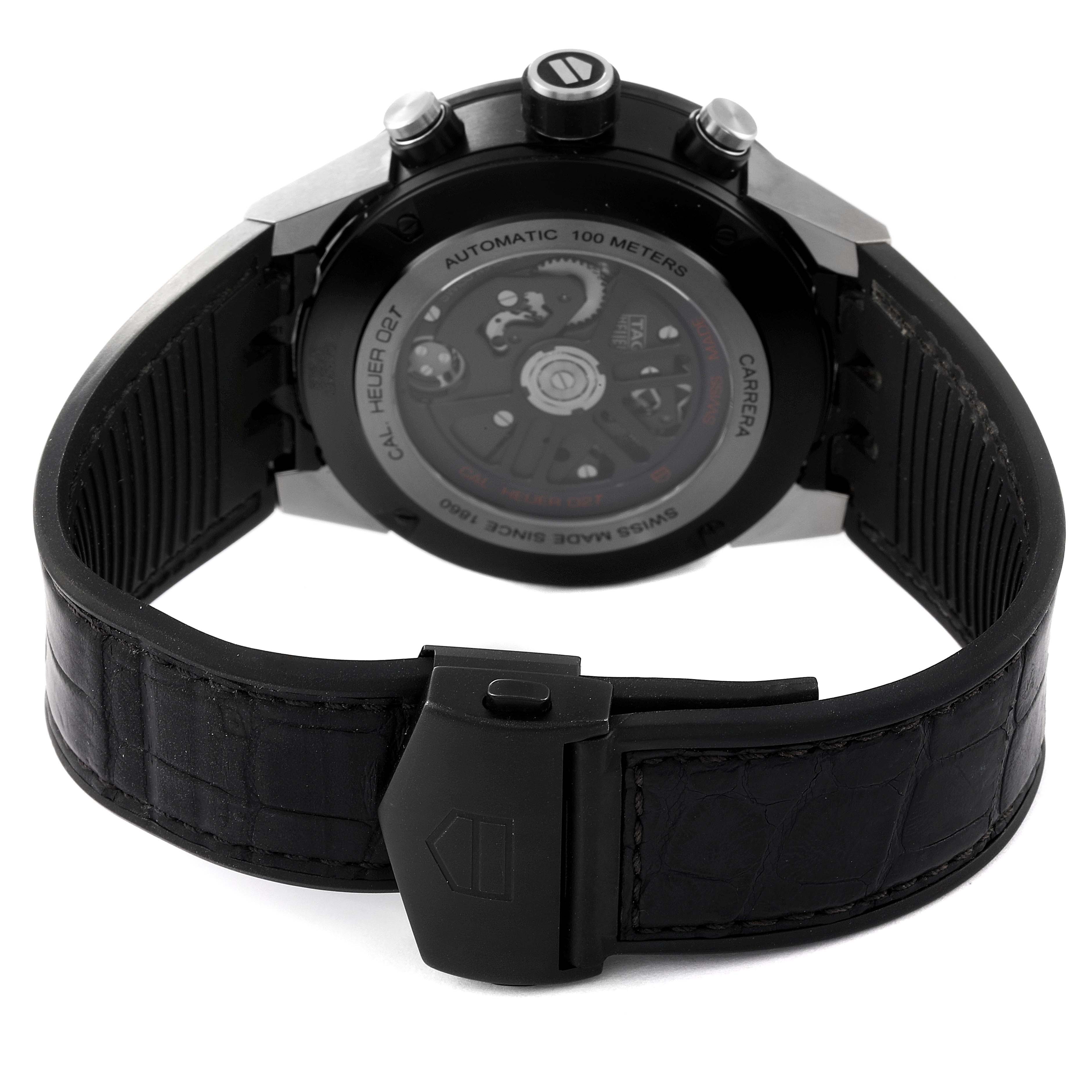 The image shows the back view of a Tag Heuer Carrera CAR5A8Y.FC6377 Men's Titanium Black Dial CAR5A8Y.FC6377 Men's Titanium Black Dial watch, emphasizing its automatic movement and clasp.