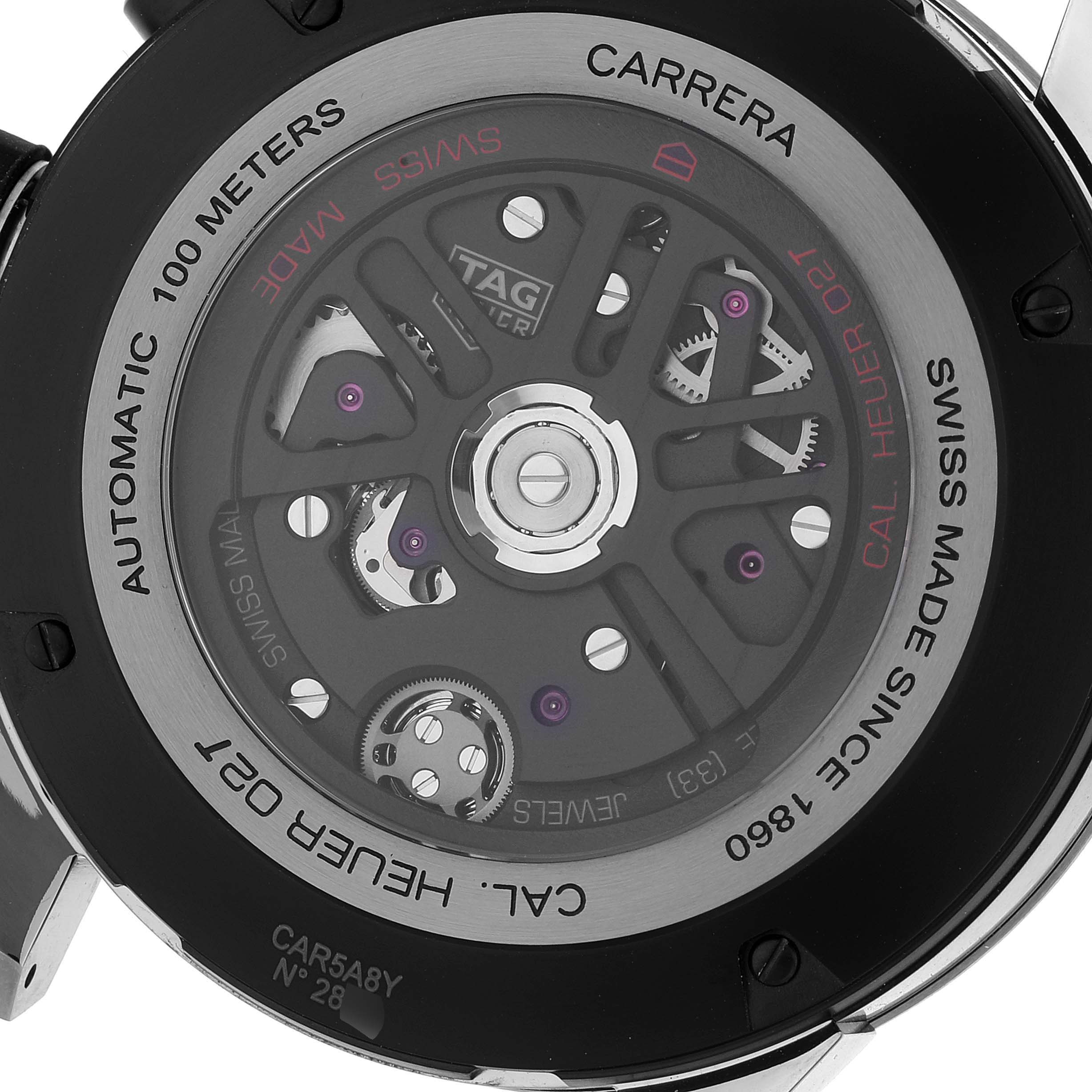 The image shows the back view of the Tag Heuer Carrera CAR5A8Y.FC6377 Men's Titanium Black Dial CAR5A8Y.FC6377 Men's Titanium Black Dial watch, highlighting its internal mechanism and engraving details.