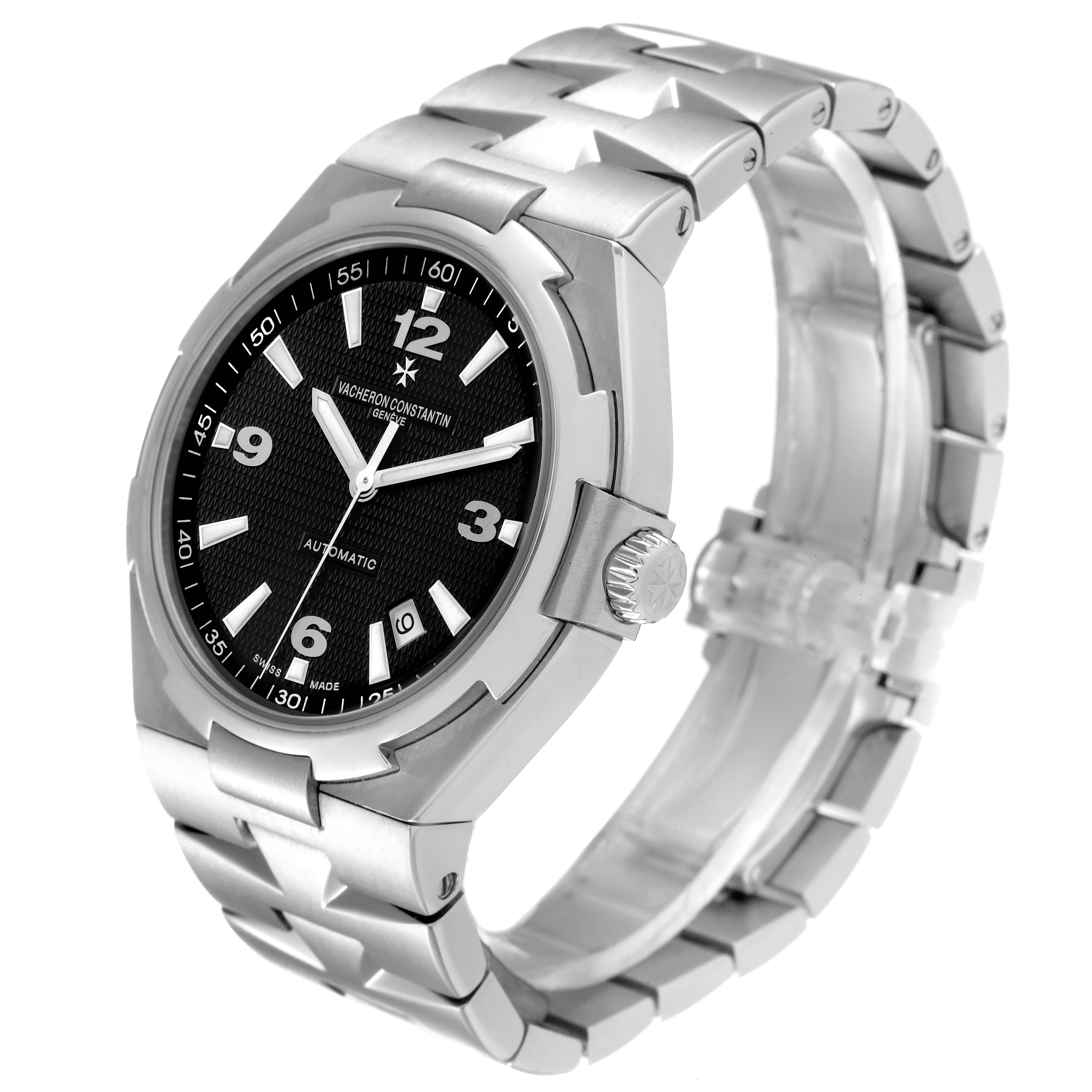 The Vacheron Constantin Overseas 47040/B01A-9094 Men's Stainless Steel Black Dial 47040/B01A-9094 Men's Stainless Steel Black Dial watch is shown from an angled side view, highlighting the case, bezel, dial, crown, and bracelet.