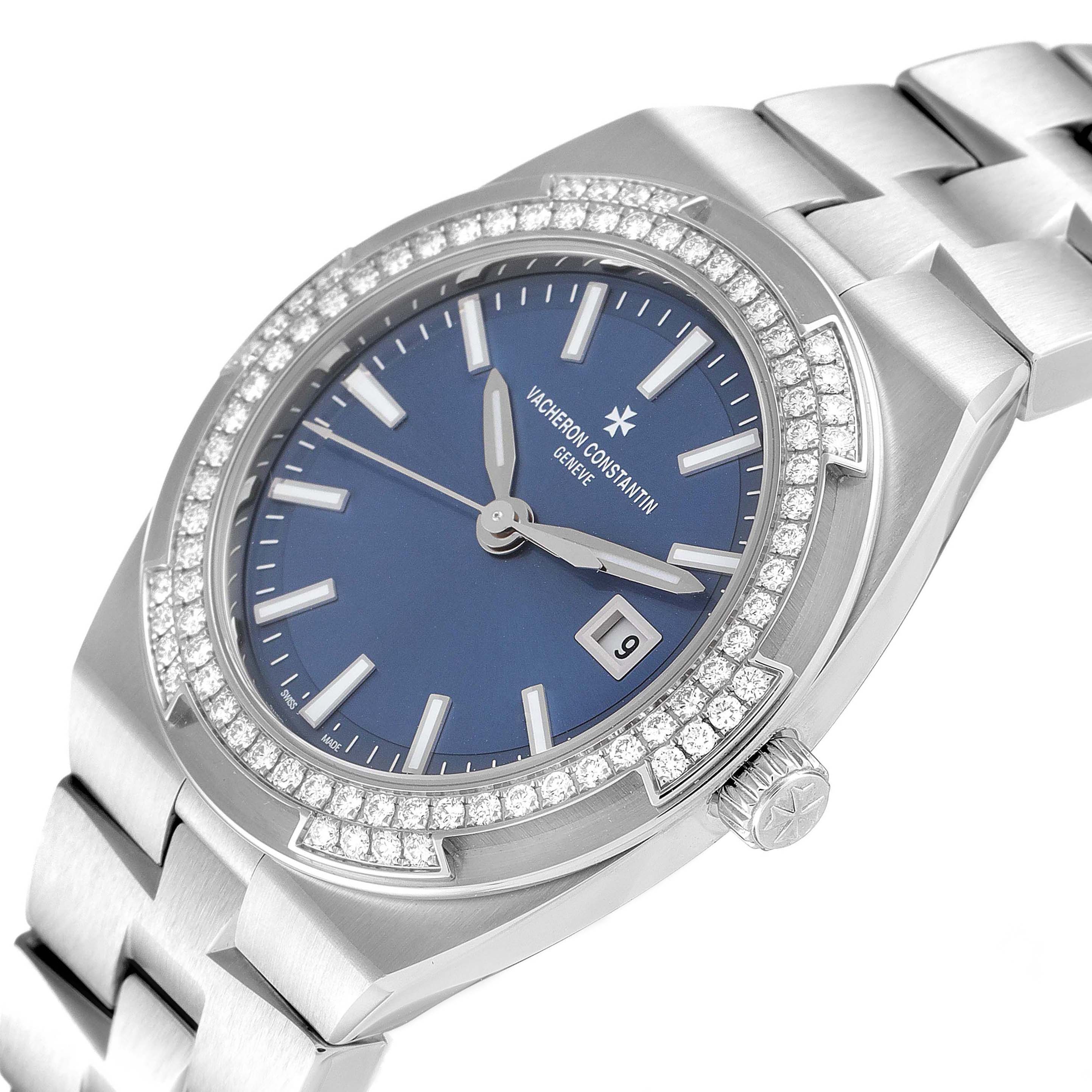 The Vacheron Constantin Overseas 1205V/100A-B590 Women's Stainless Steel Blue Dial watch is shown at an angled top view, displaying its face, bezel, and bracelet.