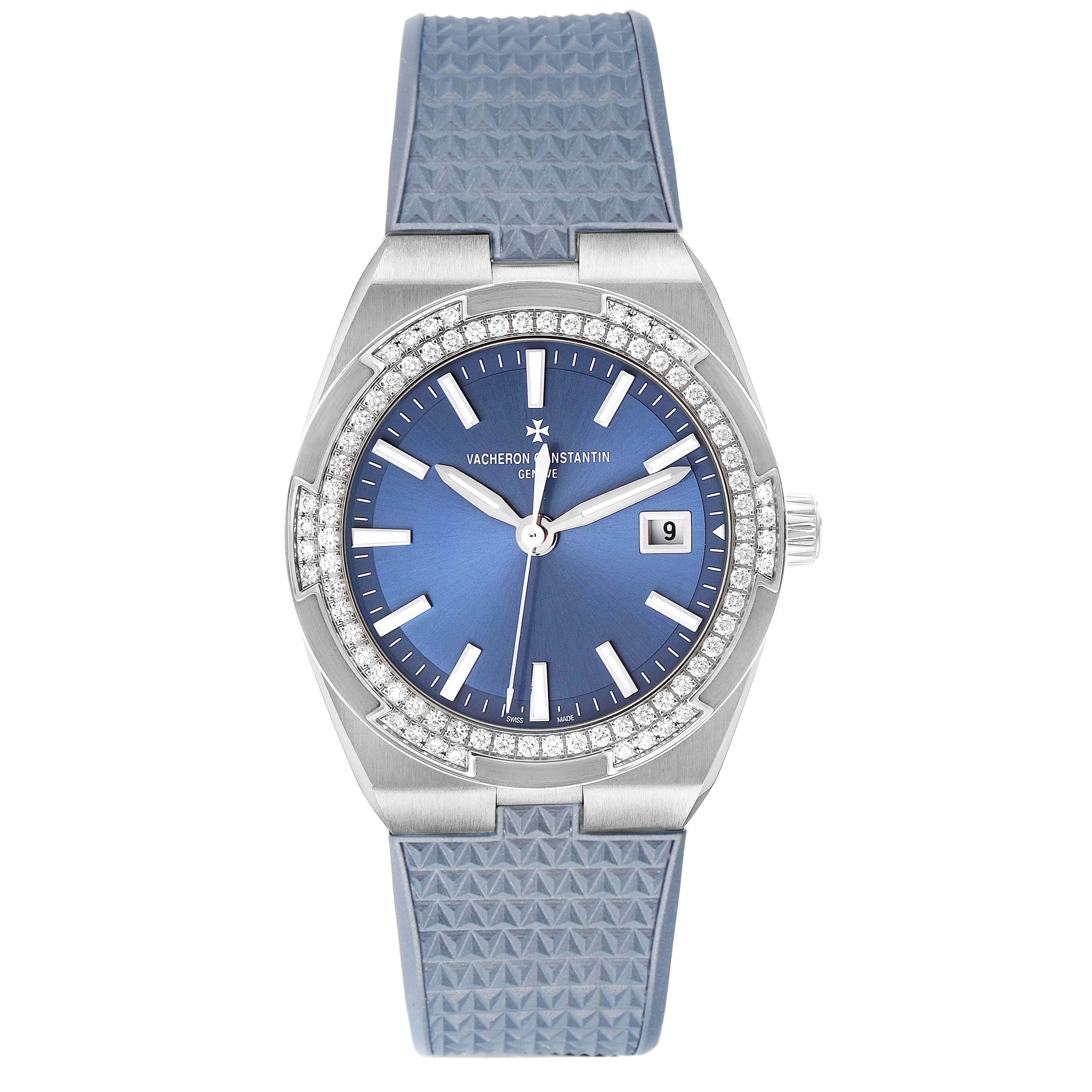 The Vacheron Constantin Overseas 1205V/100A-B590 Women's Stainless Steel Blue Dial watch is shown from a top-down angle, showcasing the dial, bezel, and blue strap.