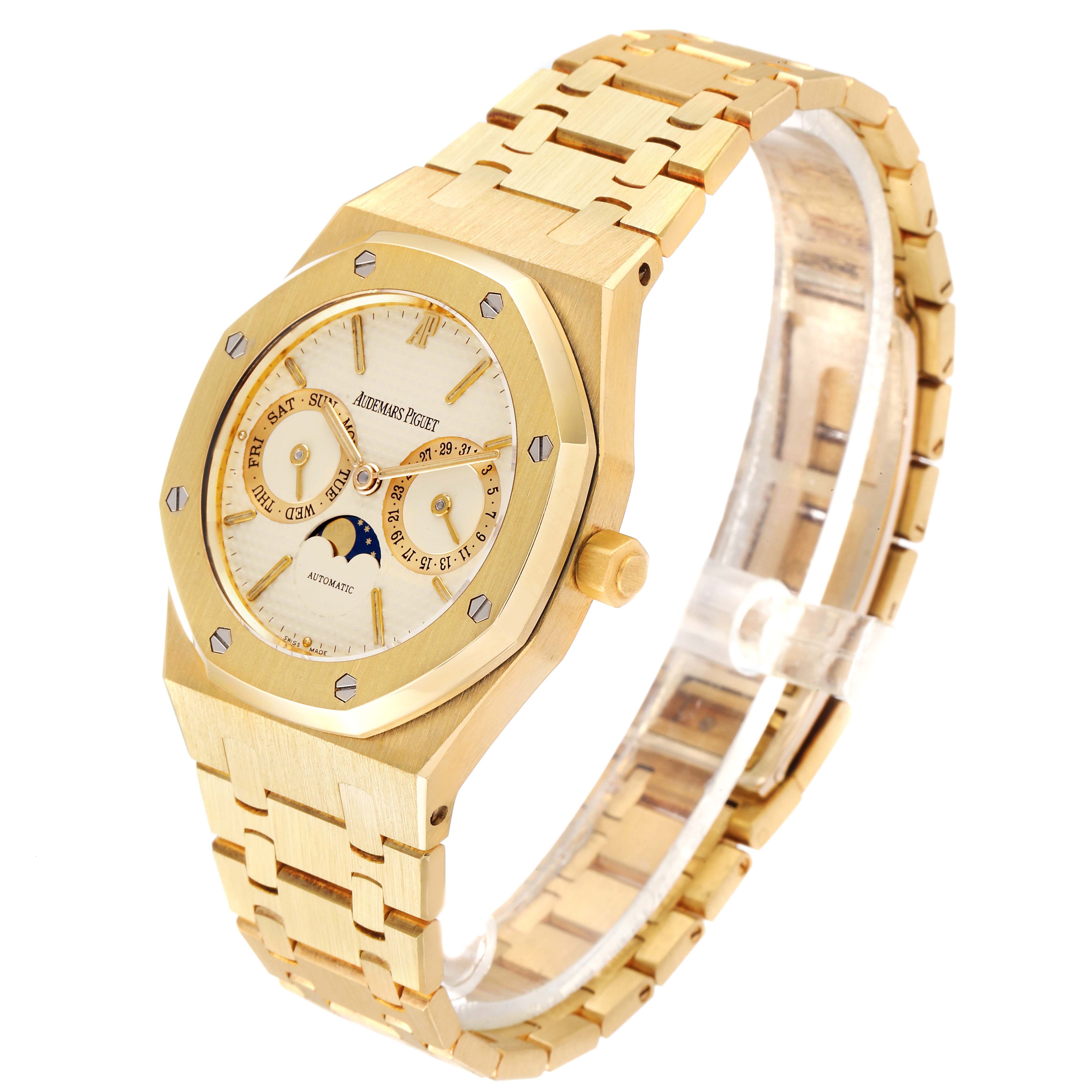 The image shows a side and angled front view of an Audemars Piguet Royal Oak 25594BA.OO.0477BA.01 Men's Yellow Gold Champagne Dial 25594BA.OO.0477BA.01 Men's Yellow Gold Champagne Dial watch, displaying the dial, bezel, and bracelet.