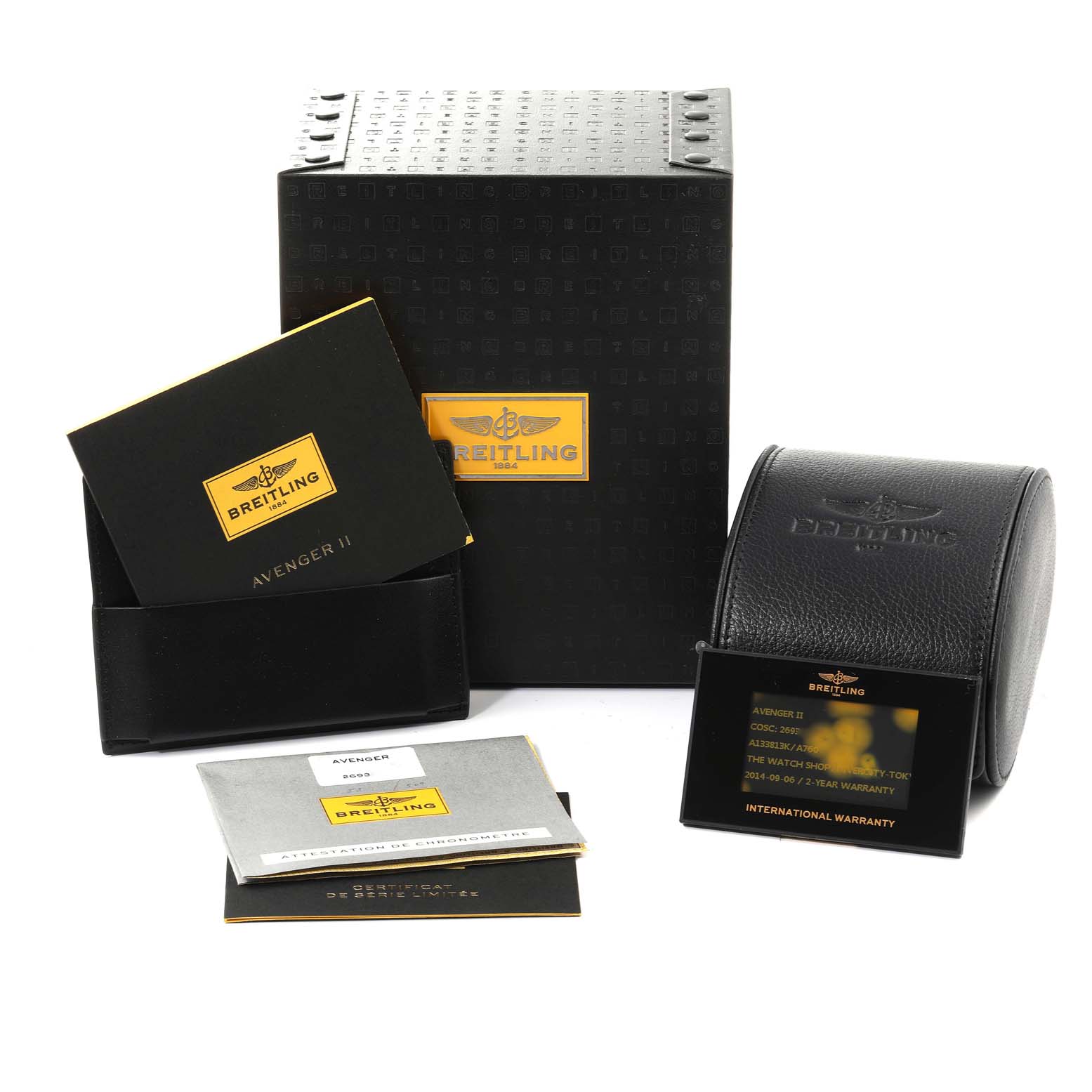 The image shows packaging and documentation for the Breitling Avenger A13381 Men's Stainless Steel White Dial A13381 Men's Stainless Steel White Dial model, including boxes, manuals, and an international warranty card.