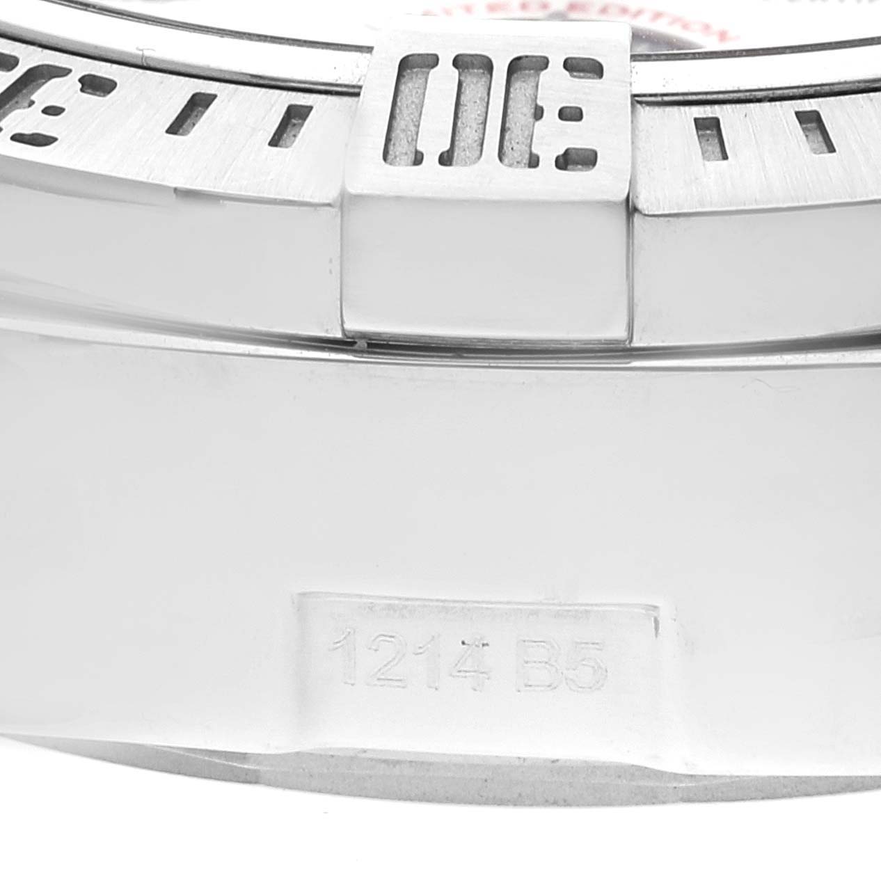 This image shows a close-up of the bezel and part of the case back of a Breitling Avenger A13381 Men's Stainless Steel White Dial A13381 Men's Stainless Steel White Dial watch.