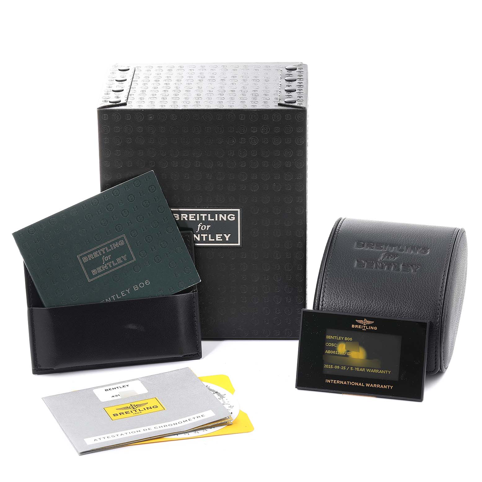 This image shows the packaging, warranty card, manuals, and a storage case for the Breitling Bentley AB0611 Men's Stainless Steel Silver Dial AB0611 Men's Stainless Steel Silver Dial model watch.