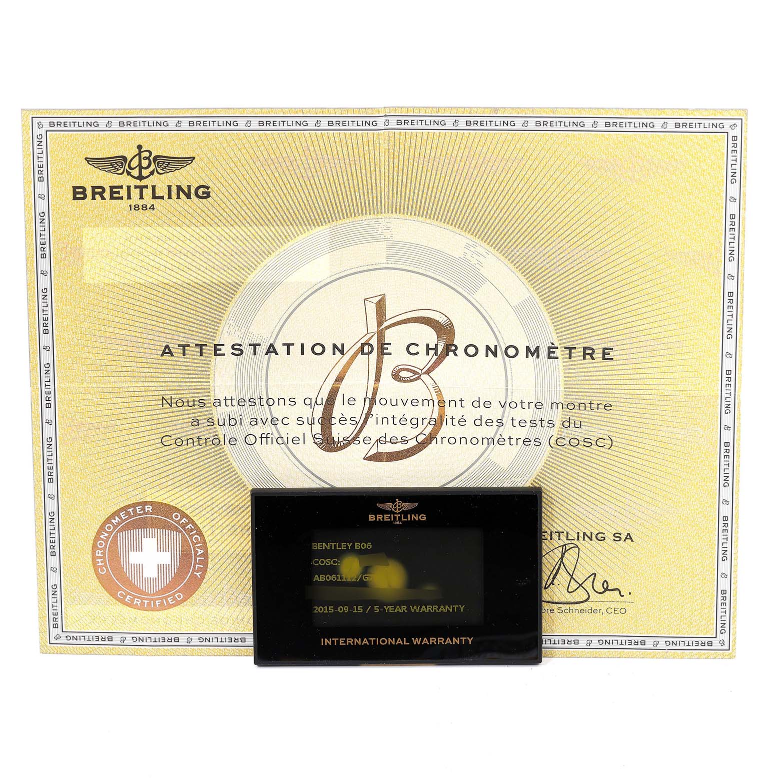 The image shows a warranty card and certification document for a Bentley B06 model by Breitling.