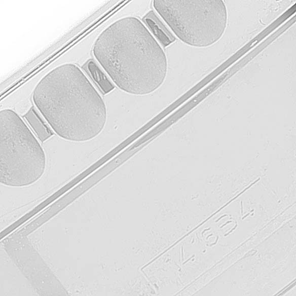 The image shows a close-up of the back side and a part of the clasp of a Breitling Navitimer AB0121 Men's Stainless Steel Grey Dial AB0121 Men's Stainless Steel Grey Dial watch.