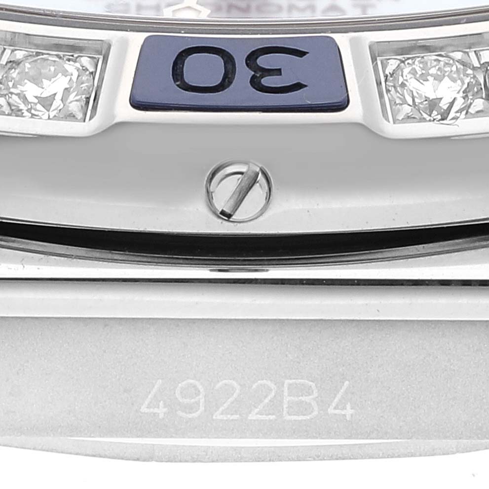 The close-up image shows part of the bezel, dial with the number "30," and a portion of the casing of the Breitling A17356 Women's Stainless Steel Blue Dial A17356 Women's Stainless Steel Blue Dial Super Chronomat Blue Dial Steel Diamond Ladies Watch A17356.