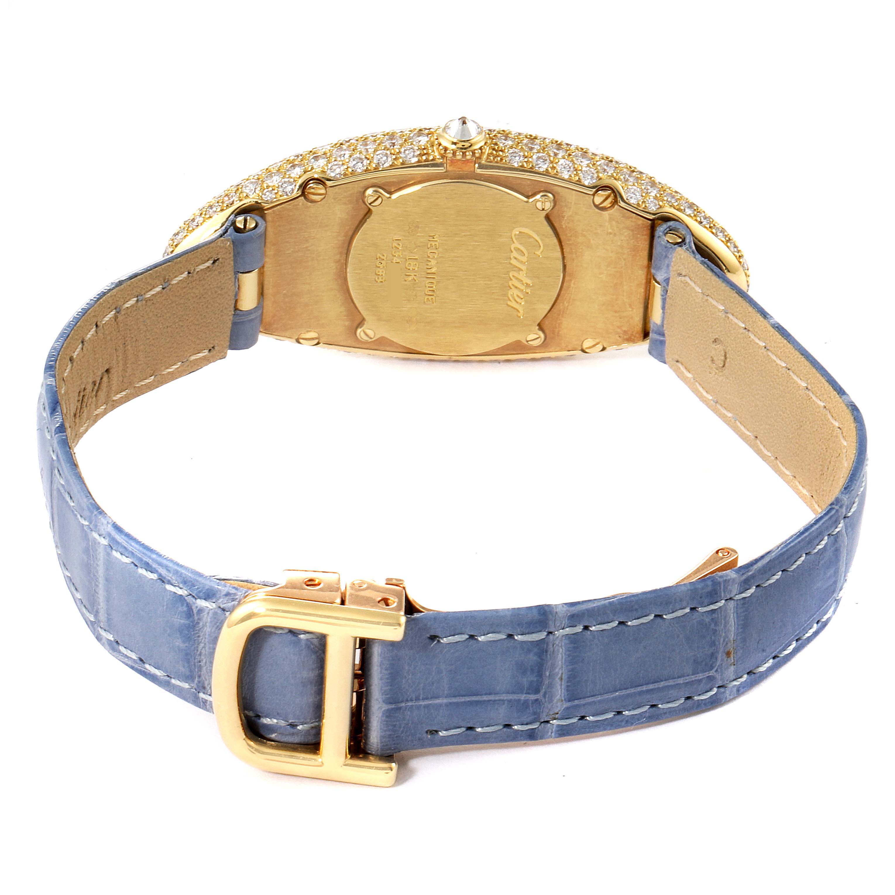 The image shows the back of a Cartier Baignoire 2583 Women's Yellow Gold Silver Dial 2583 Women's Yellow Gold Silver Dial watch, featuring a gold case with diamond embellishments and a blue leather strap.
