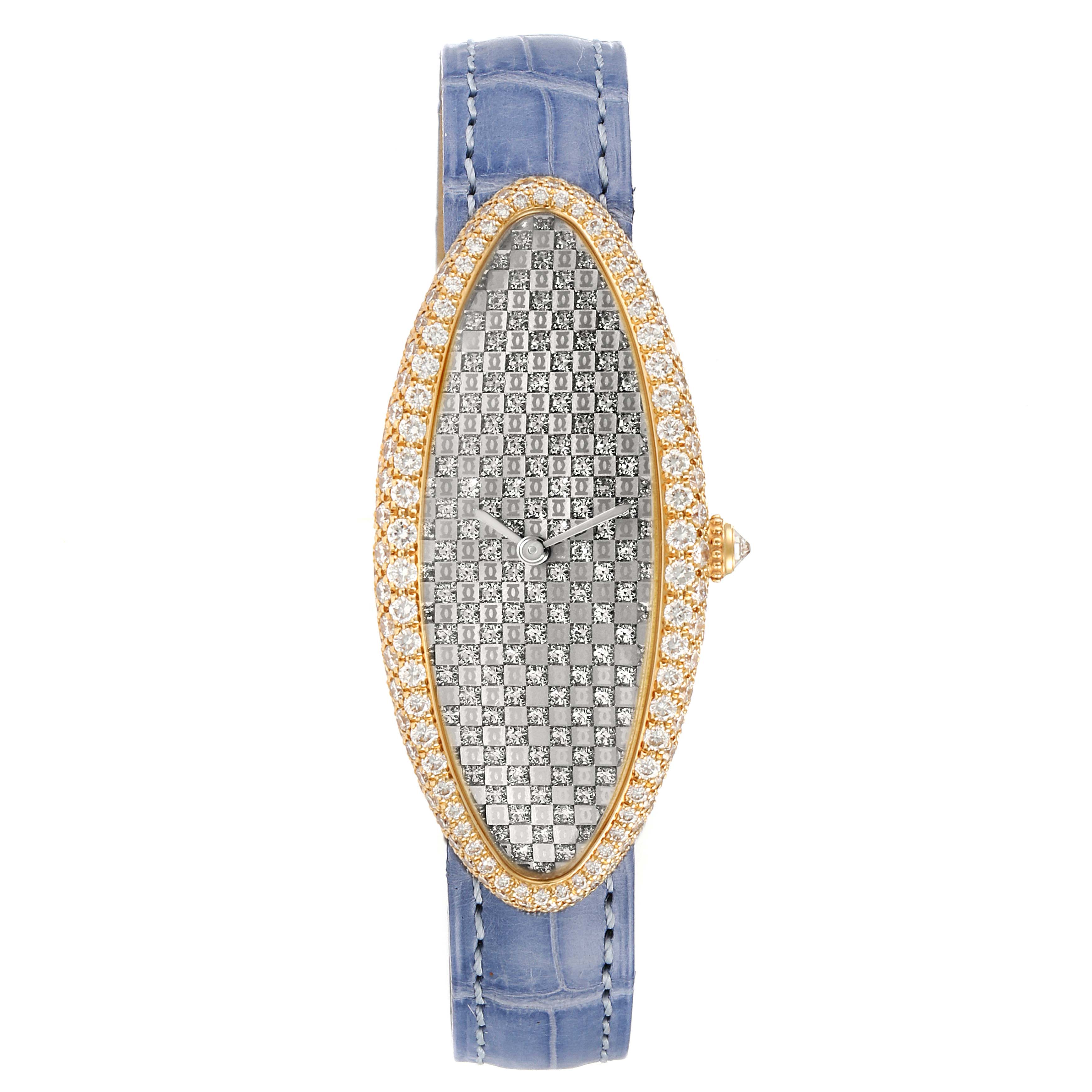 The Cartier Baignoire 2583 Women's Yellow Gold Silver Dial 2583 Women's Yellow Gold Silver Dial watch is shown from a straight-on angle, highlighting its oval face, diamond-studded bezel, and blue strap.