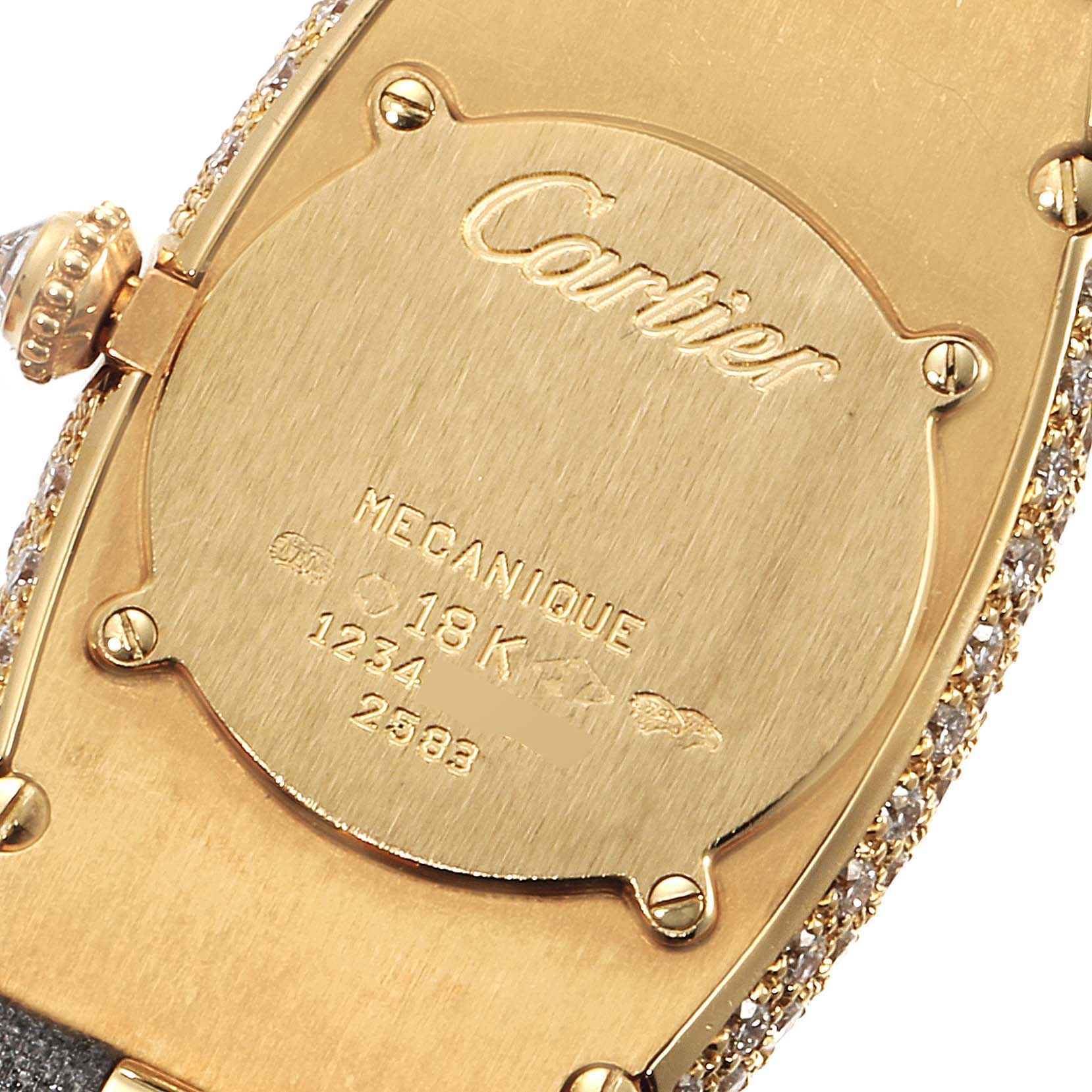 This image shows the back case of a Cartier Baignoire 2583 Women's Yellow Gold Silver Dial 2583 Women's Yellow Gold Silver Dial watch, highlighting the "Cartier" branding and "18K" gold mark.