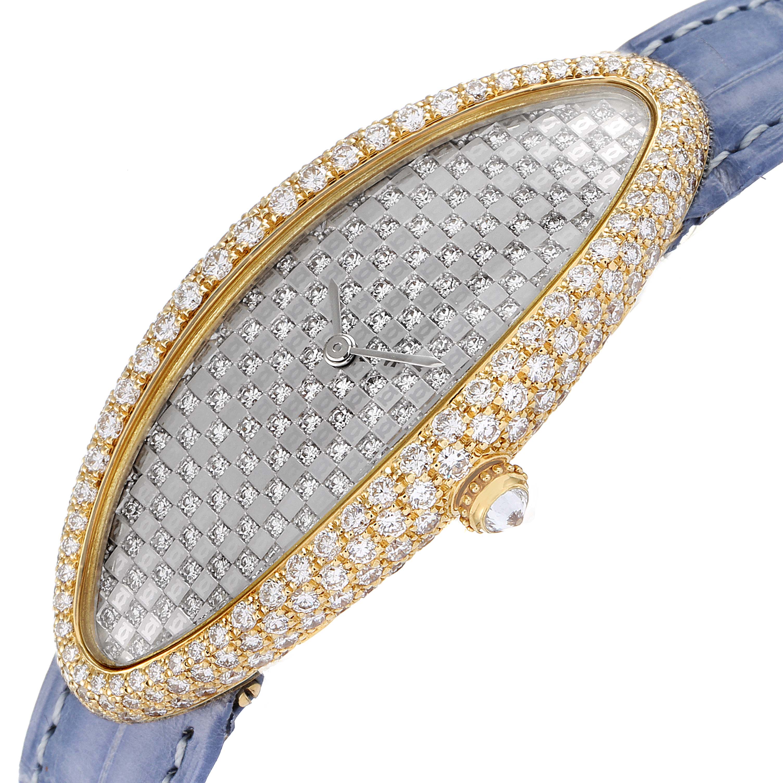The image shows a close-up angled view of the Cartier Baignoire 2583 Women's Yellow Gold Silver Dial 2583 Women's Yellow Gold Silver Dial watch, highlighting its diamond-encrusted bezel, dial, and blue strap.